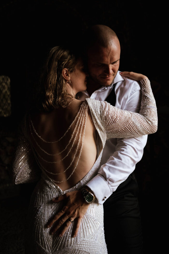 Eliza Jane Howell backless sequin wedding dress with back chains. Robin Goodlad Photography.