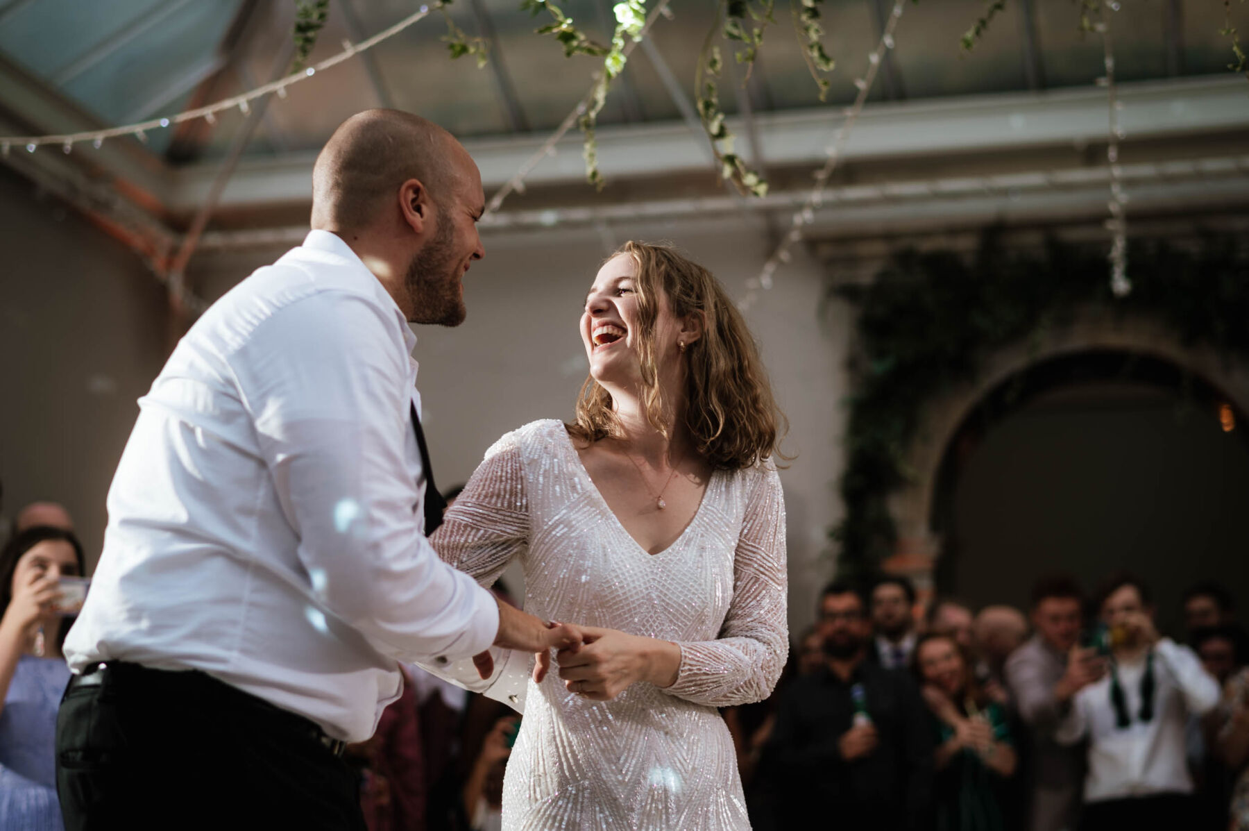 Bride and groom on the dancefloor at Hampton Court House. Robin Goodlad Photography.