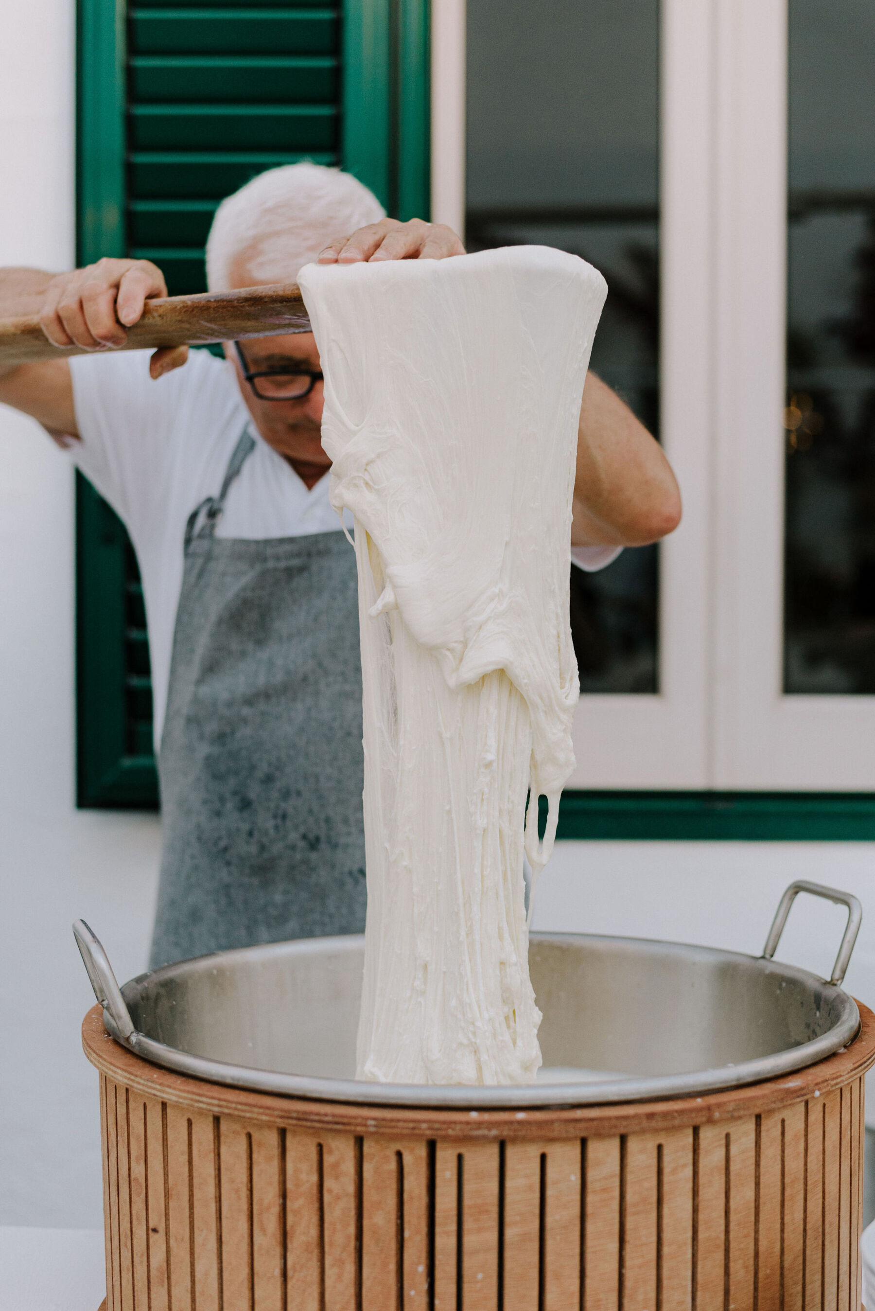 Chef making fresh pasta - Italian villa wedding.