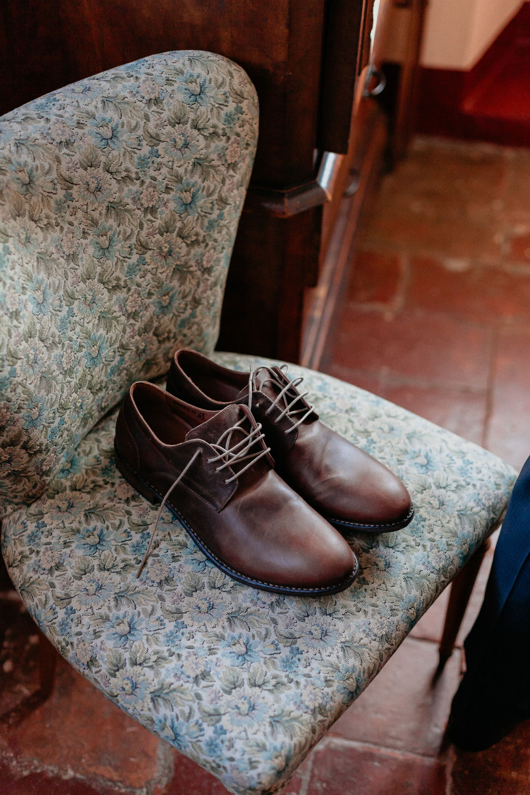Brown groom's shoes.