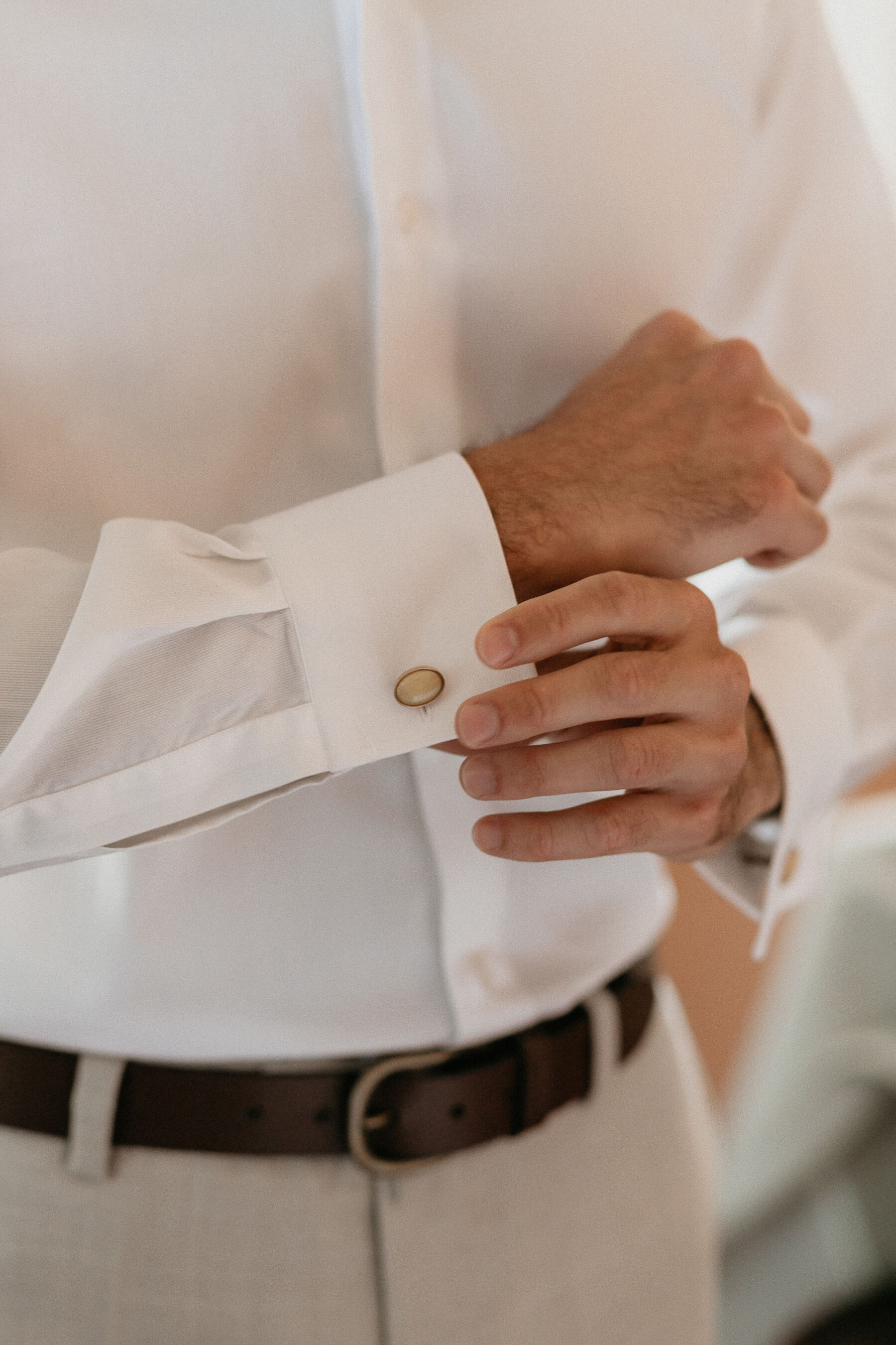 Italian groom getting ready.