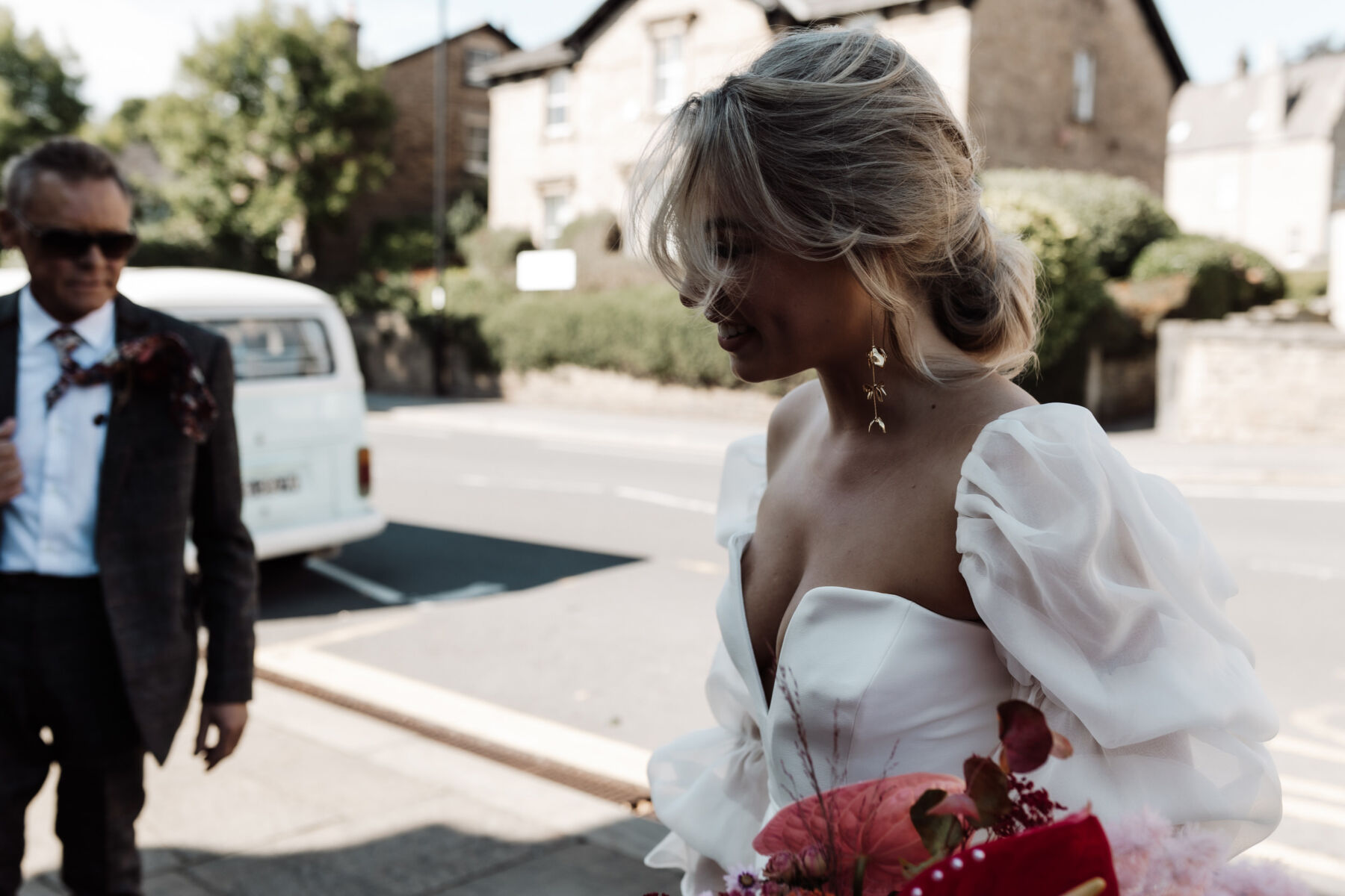 Nat, in Charlie Brear & Jesus Peiro for her Sheffield Botanical Gardens & Warehouse Party Wedding 10 Bride wearing long gold A.B.Ellie earrings