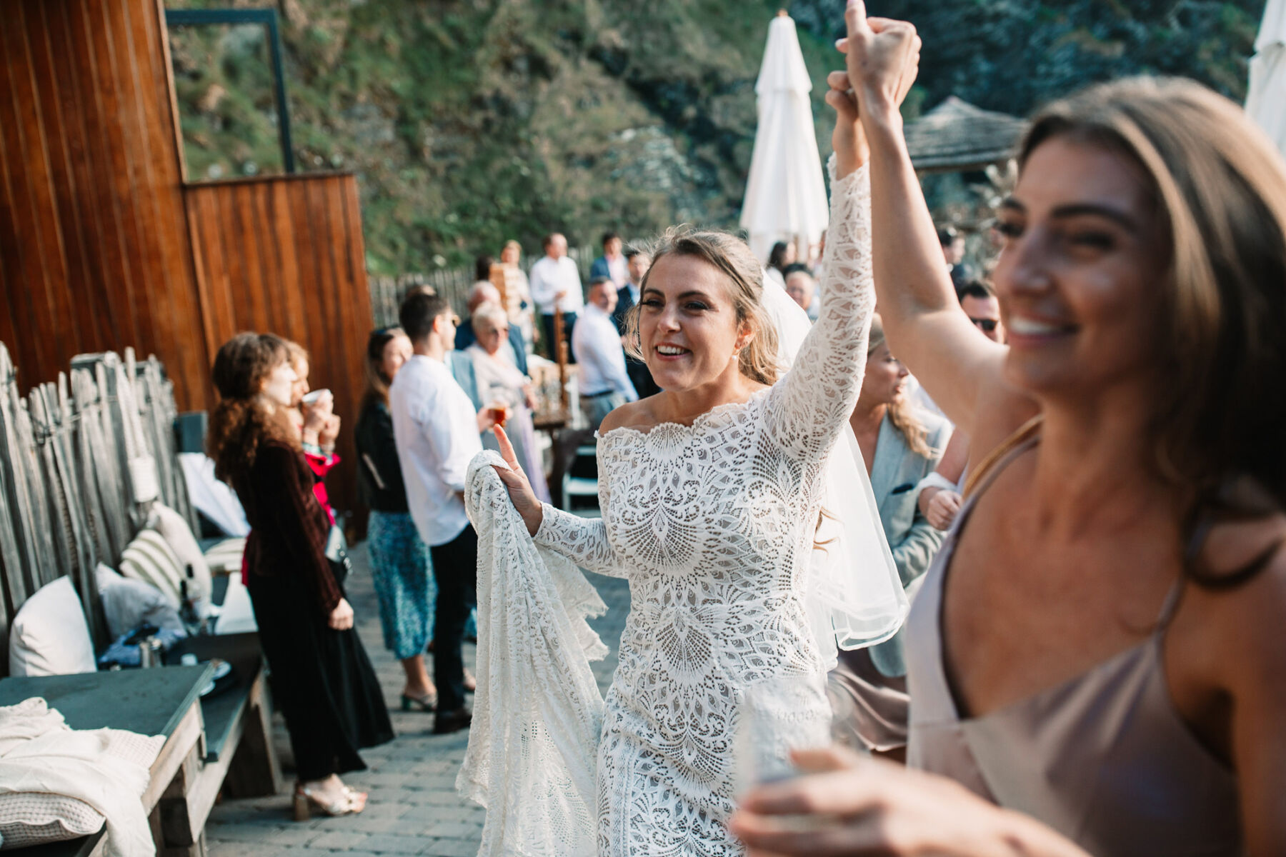 A Devon Wedding with a Sea View for Georgie in Grace Loves Lace 44 Bride dancing at her wedding
