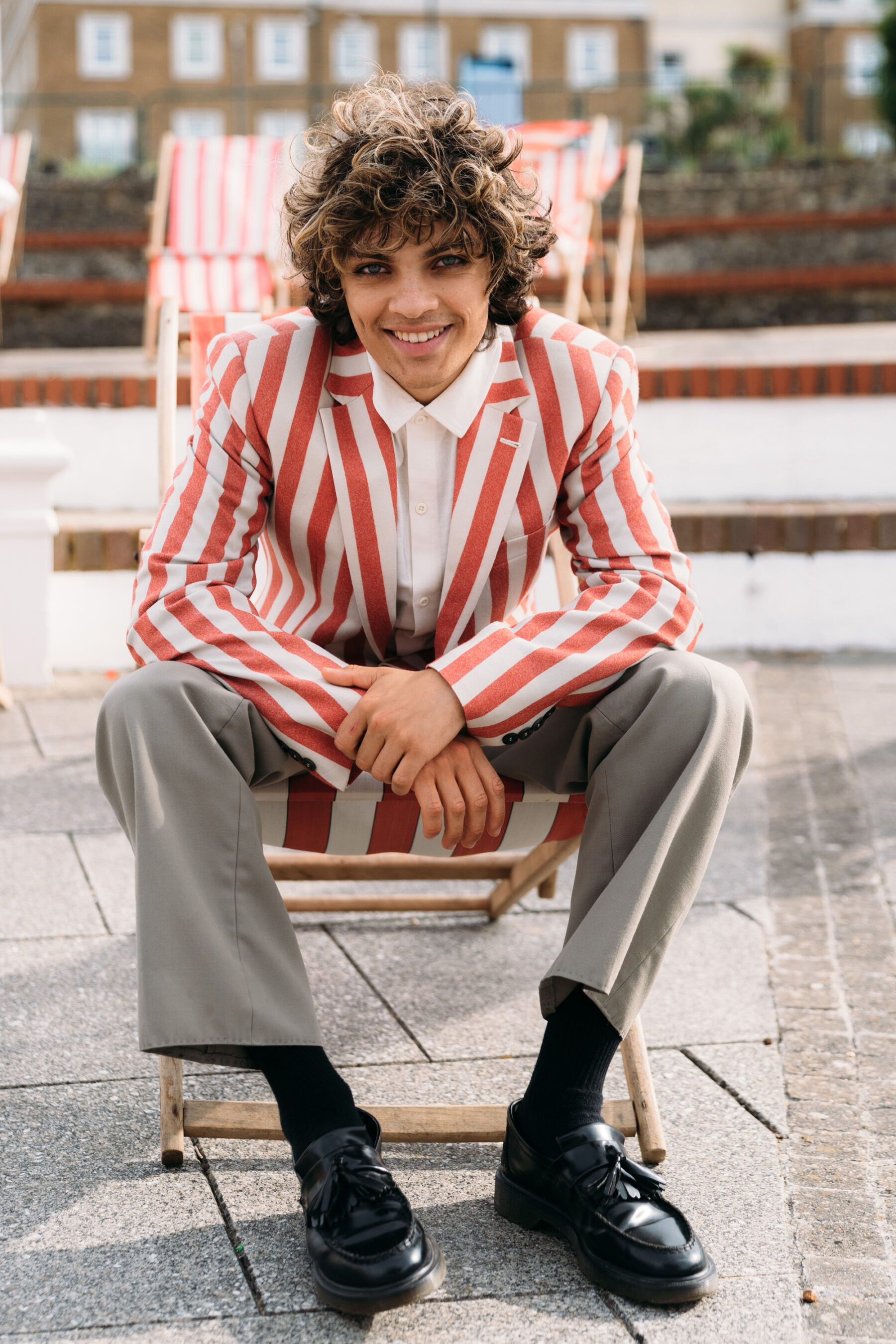 Groom in red and white stripy jacket. Joanna Bongard Photography.