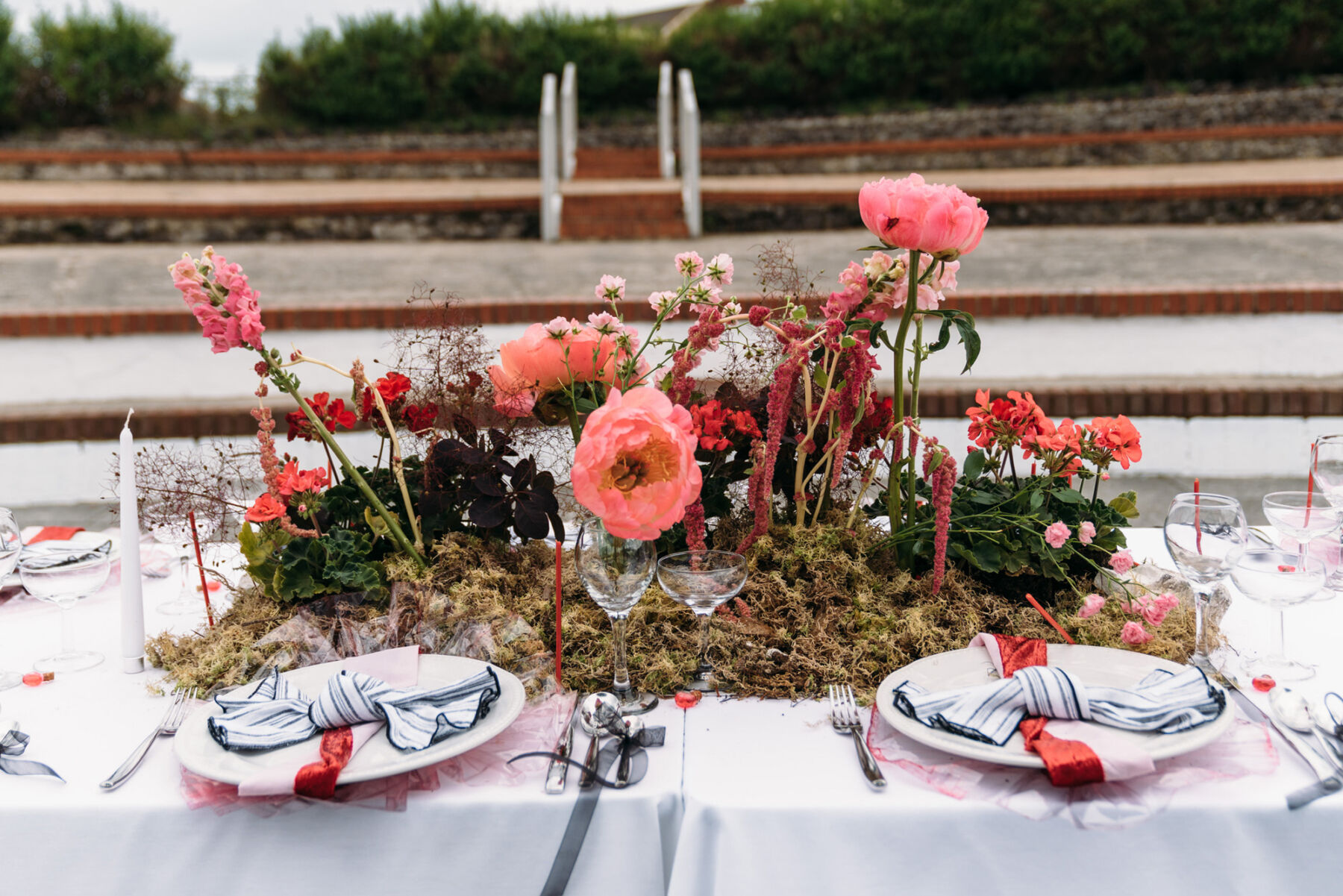 Wedding table meadow flowers with moss and peonies. Joanna Bongard Photography.