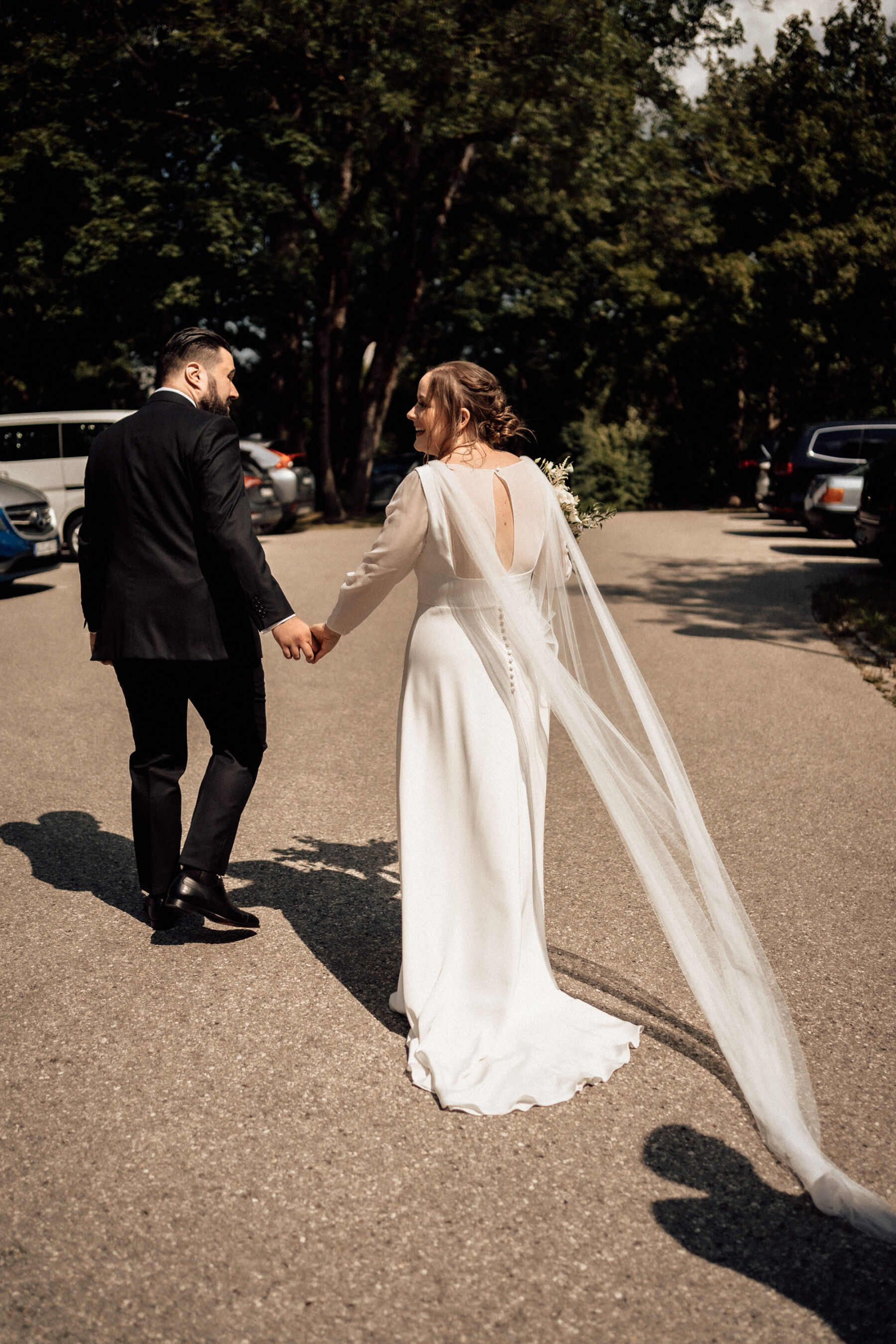 Andrea Hawkes Bridal wedding dress with long sheer sleeves