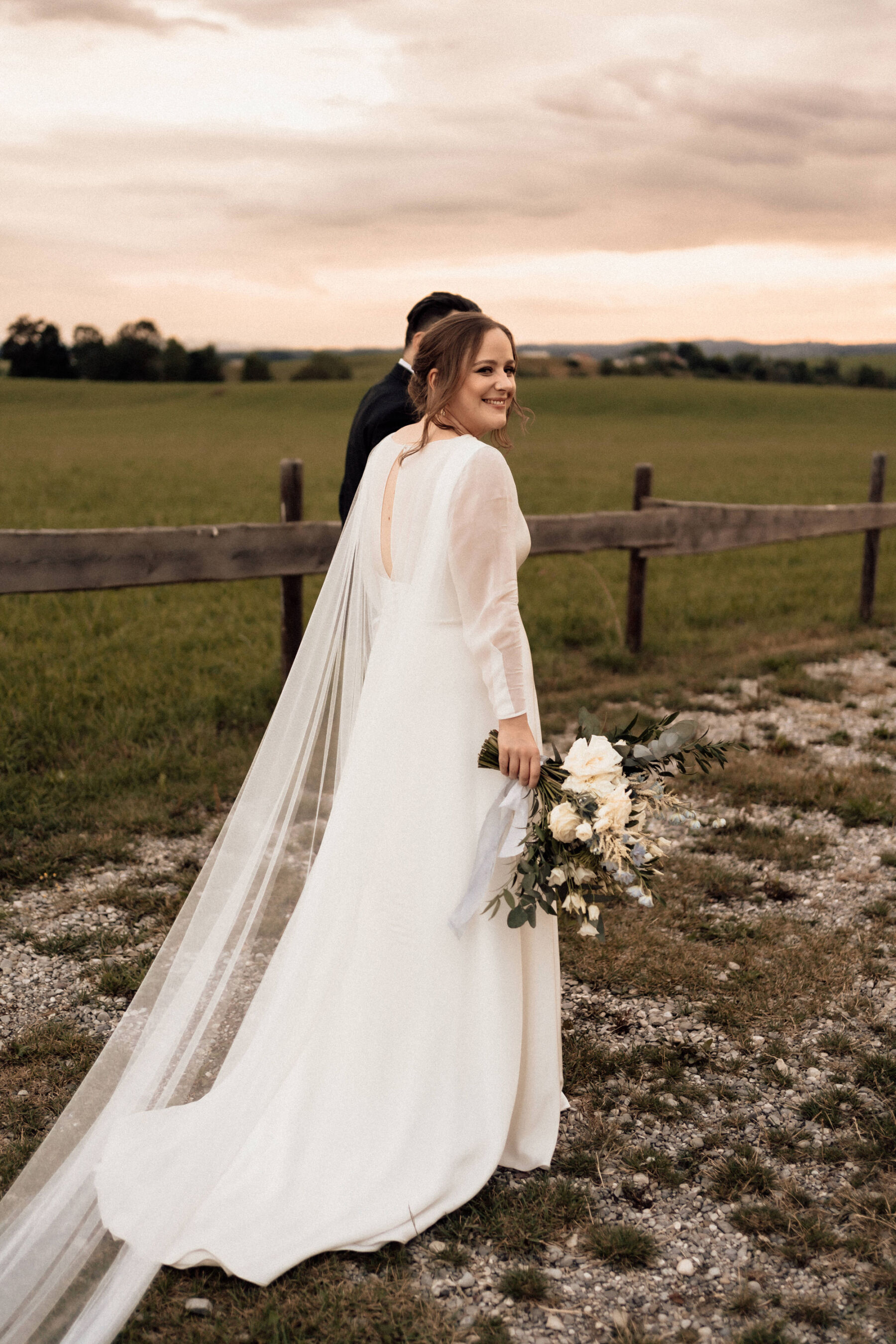 Andrea Hawkes Bridal wedding dress with long sheer sleeves