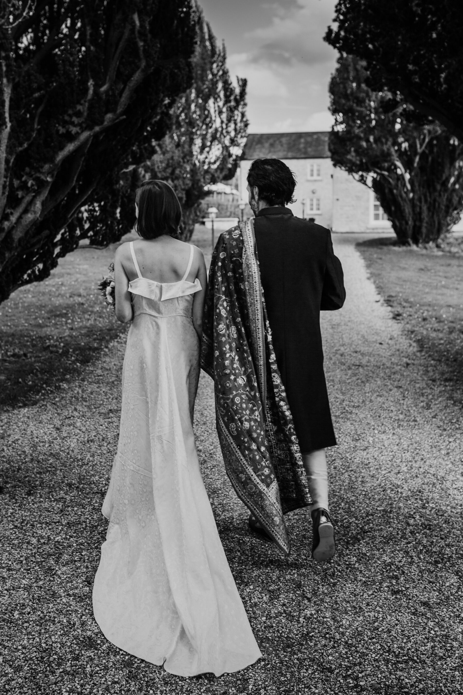Black and white image of bride and groom at Barton Hall wedding.