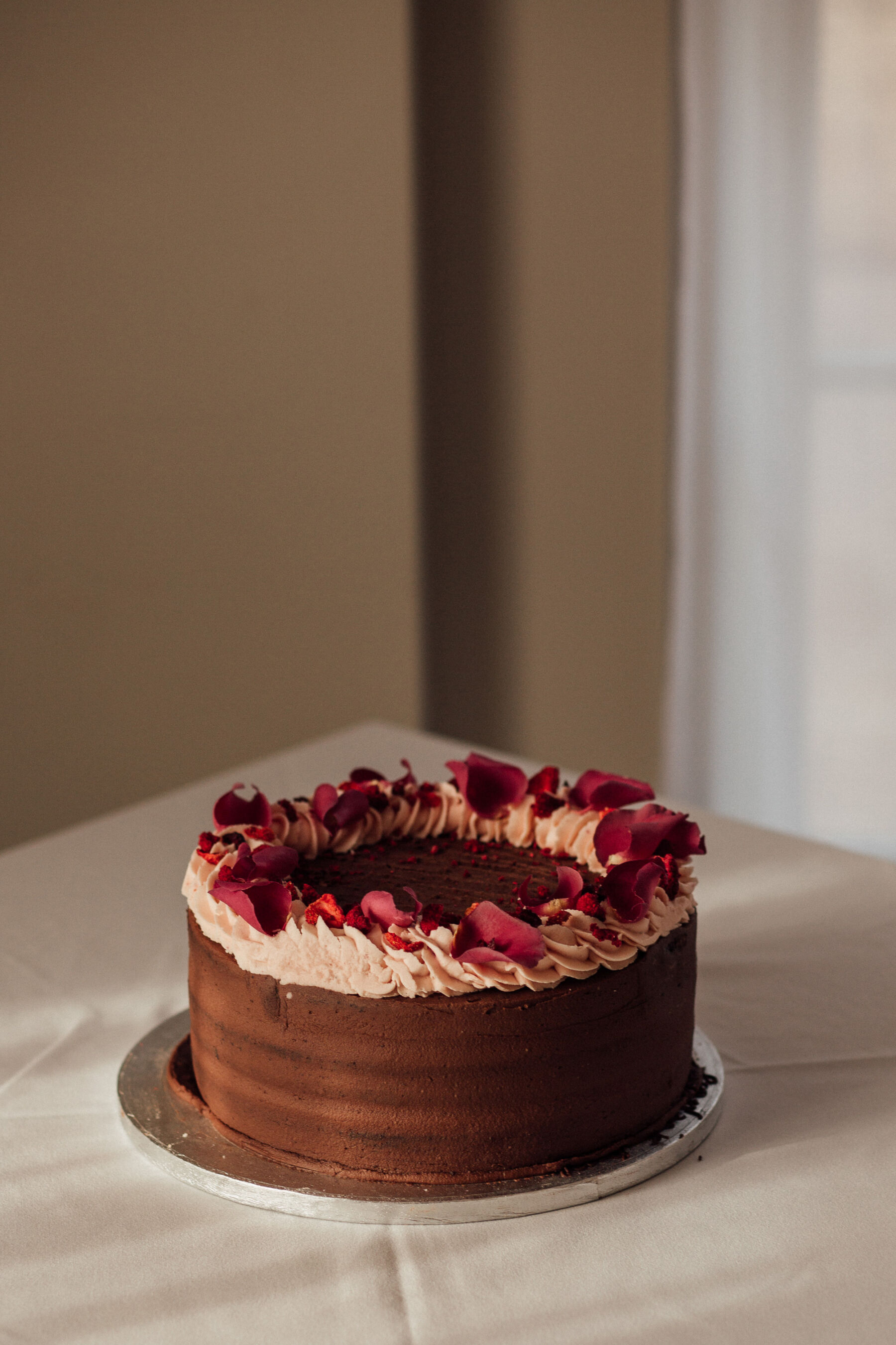 Lucy, in her Gran's 1950's Wedding Dress for her Autumn Wedding at Barton Hall 40 Chocolate wedding cake.