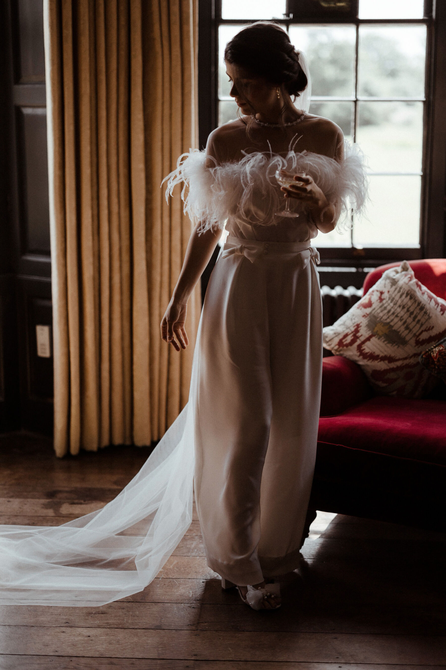 Quiet Moments of Bridal Fashion With Wilden London & Rebecca Anne Designs 16 Bride wearing ostrich feather top and silk trousers by Wilden London, Embroidered wedding veil by Rebecca Anne Designs.