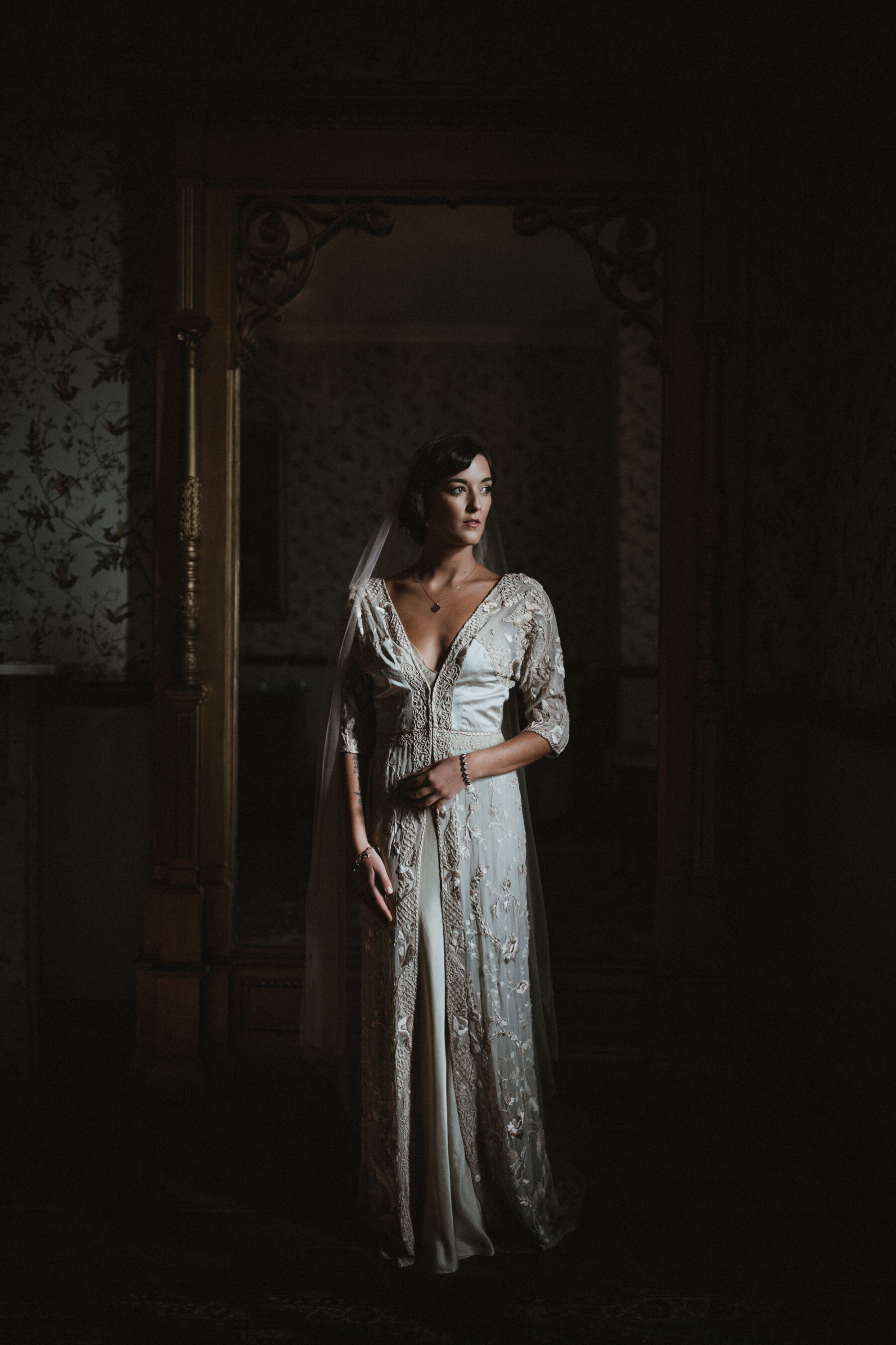 Bride in 1920s inspired vintage wedding dress.