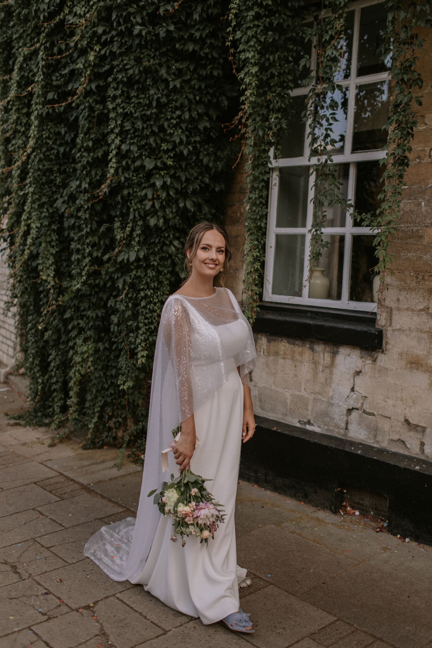 Charlie Brear wedding dress and sequin cape