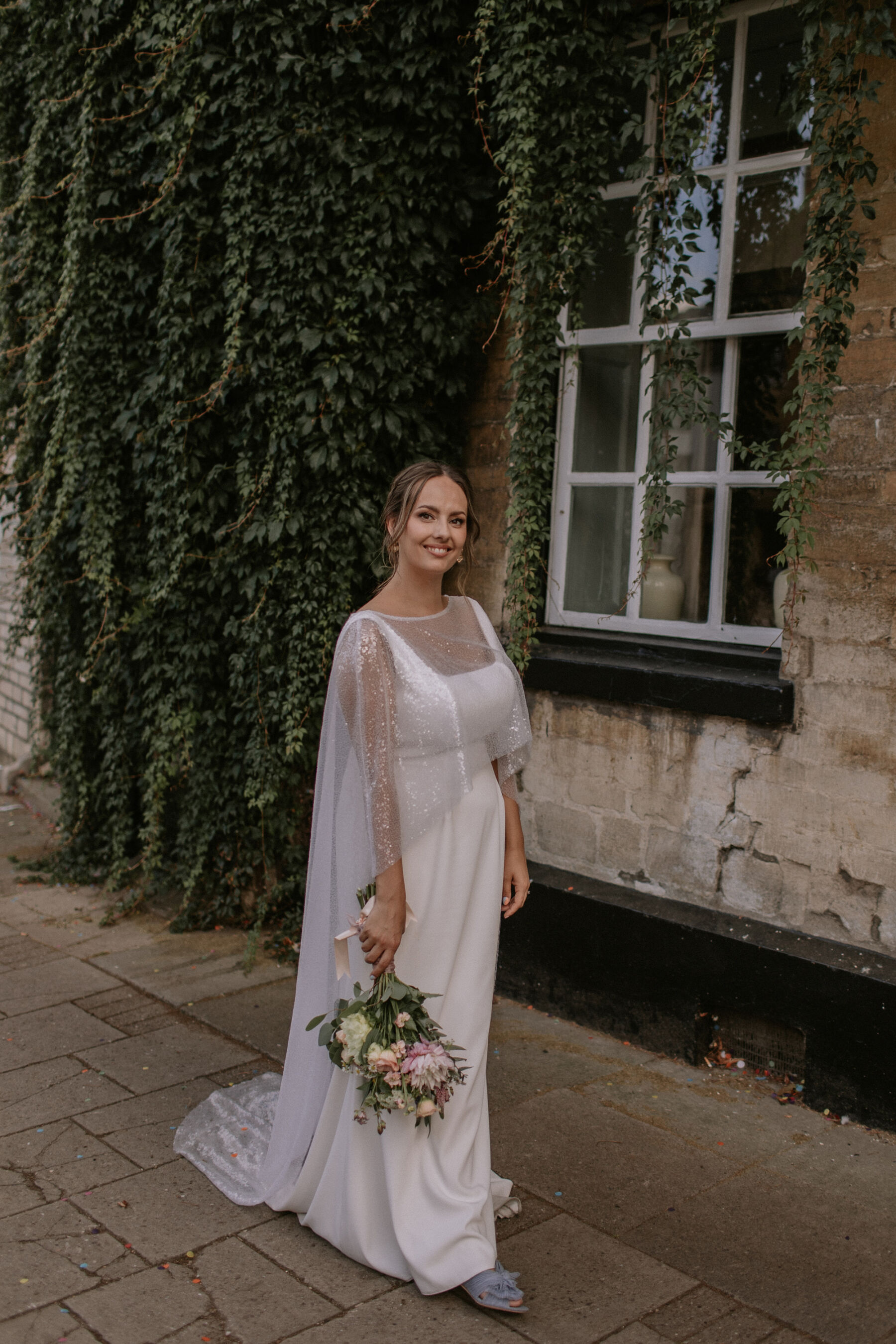 Charlie Brear wedding dress and sequin cape