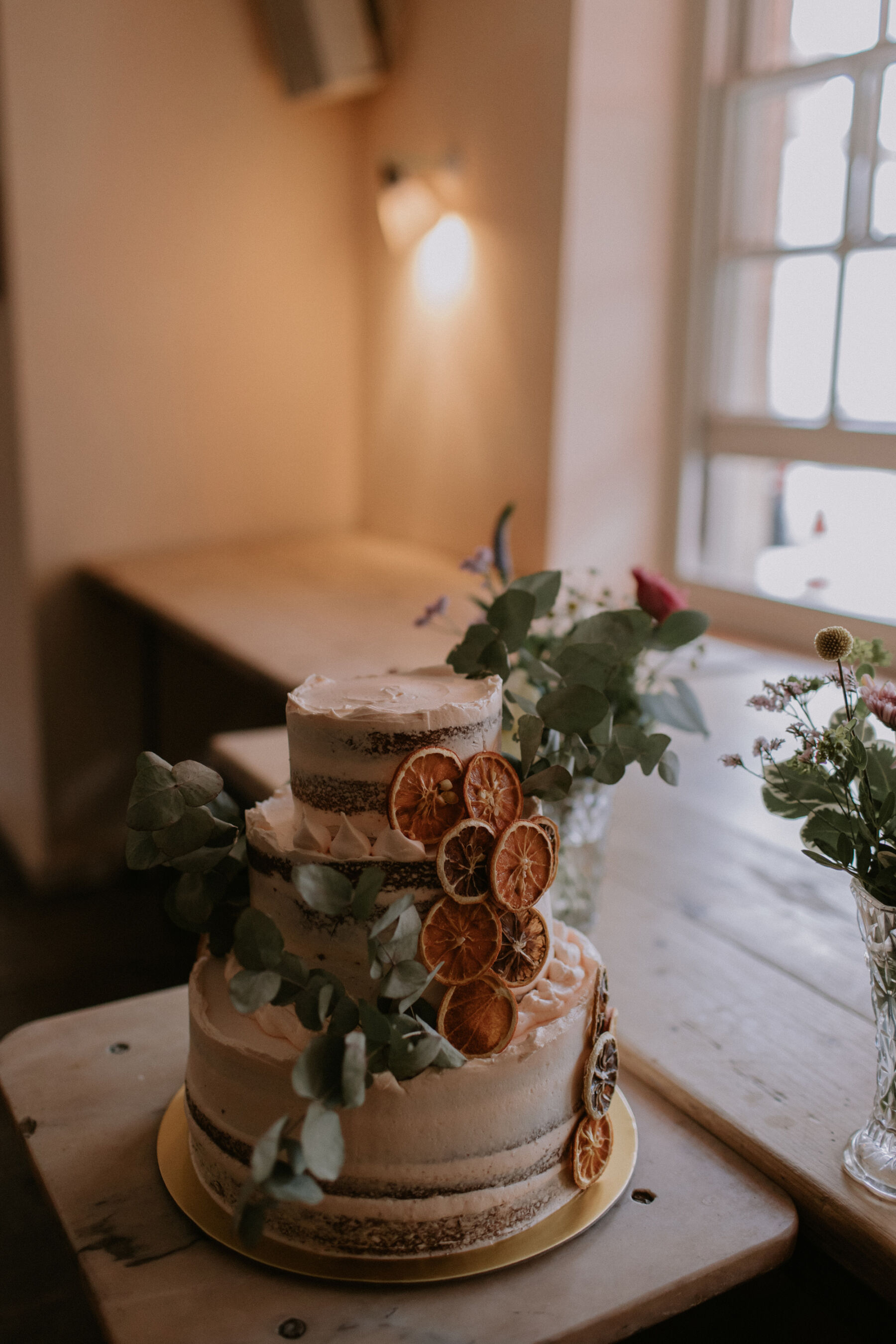 Wedding cake with eucalyptus