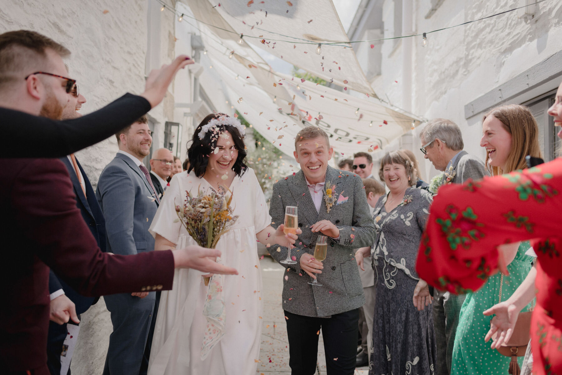 Confetti shot - bride and groom just married in Cornwall