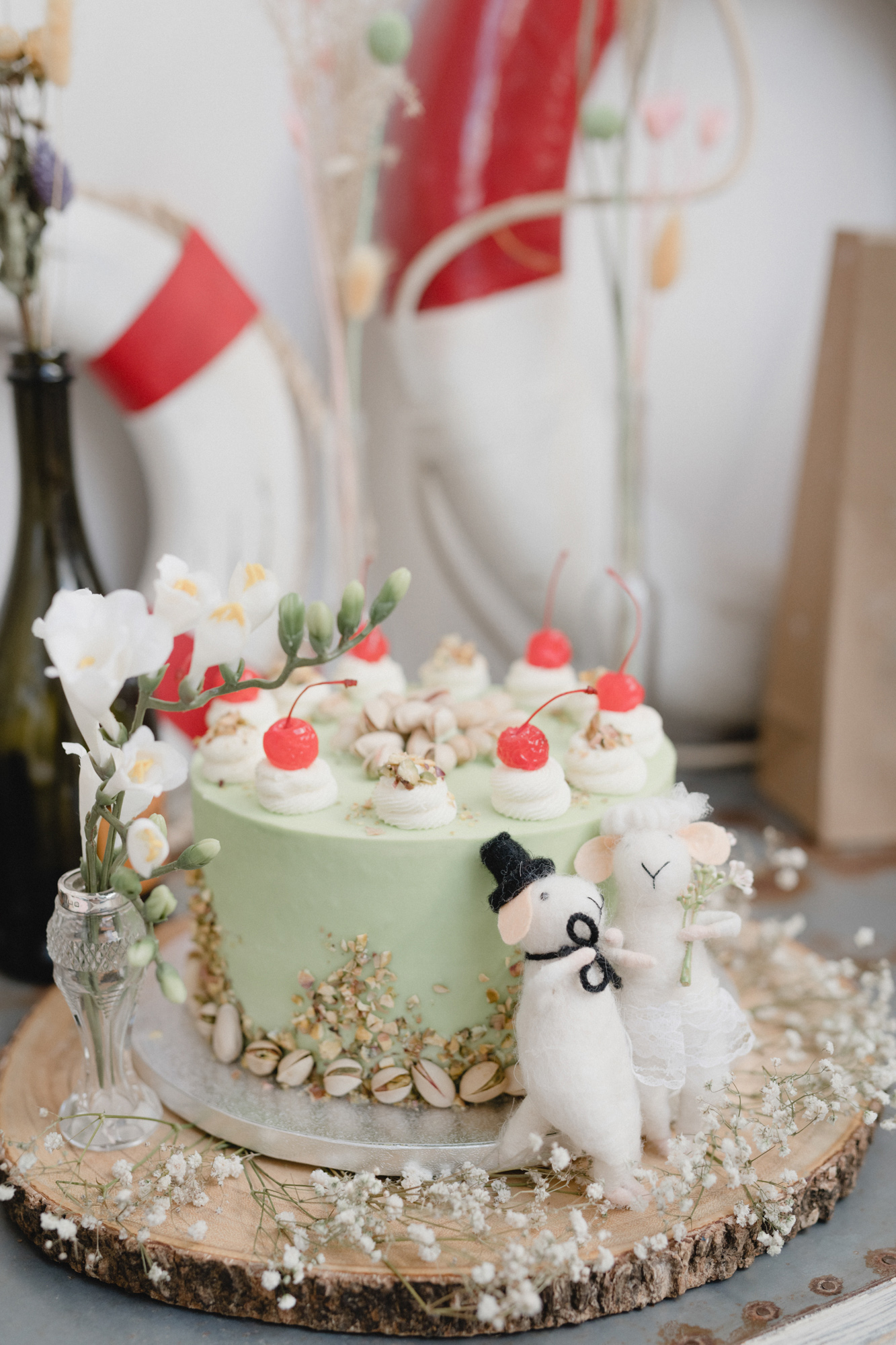 Pale green single tier wedding cake