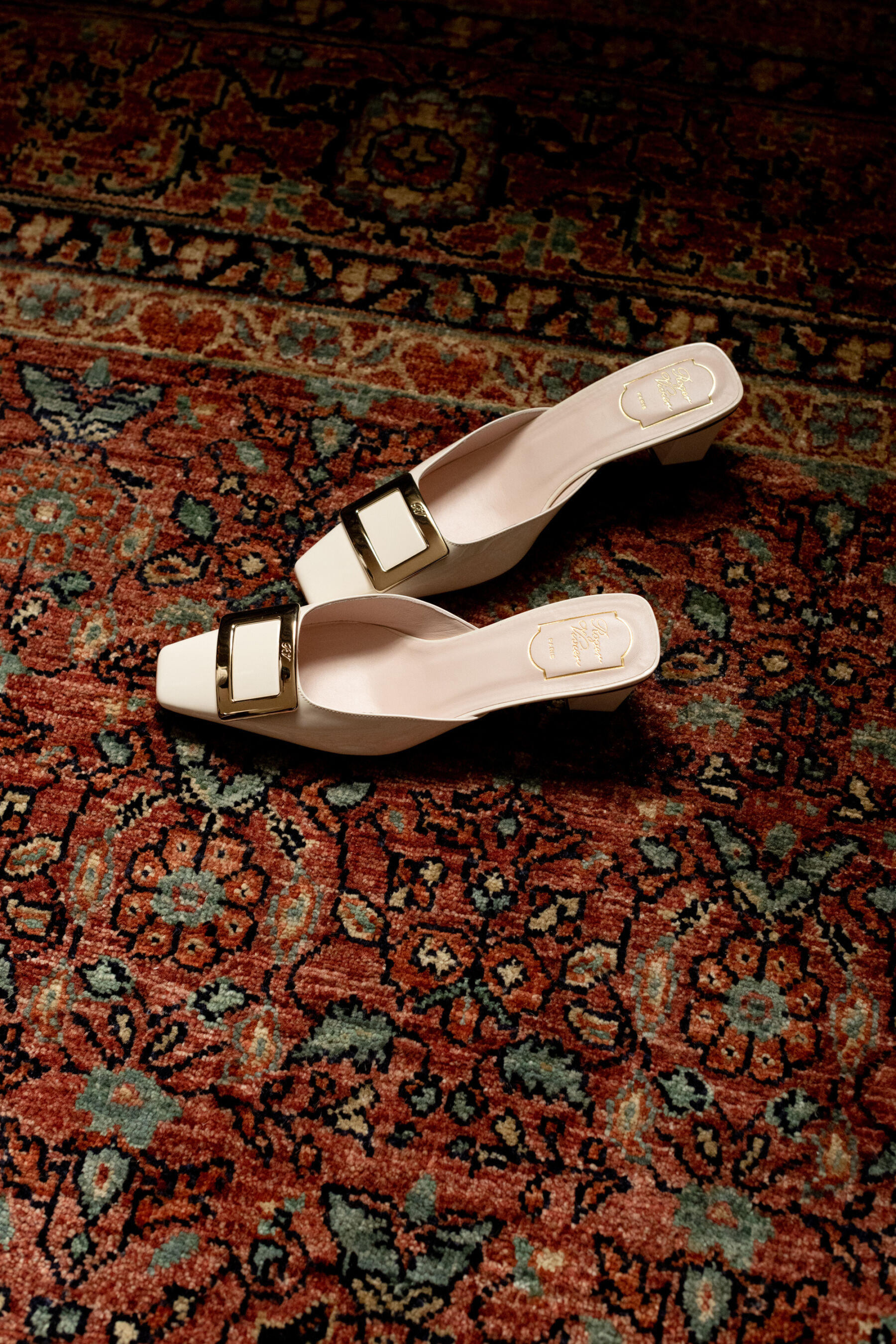 Roger Vivier Mules with buckle.