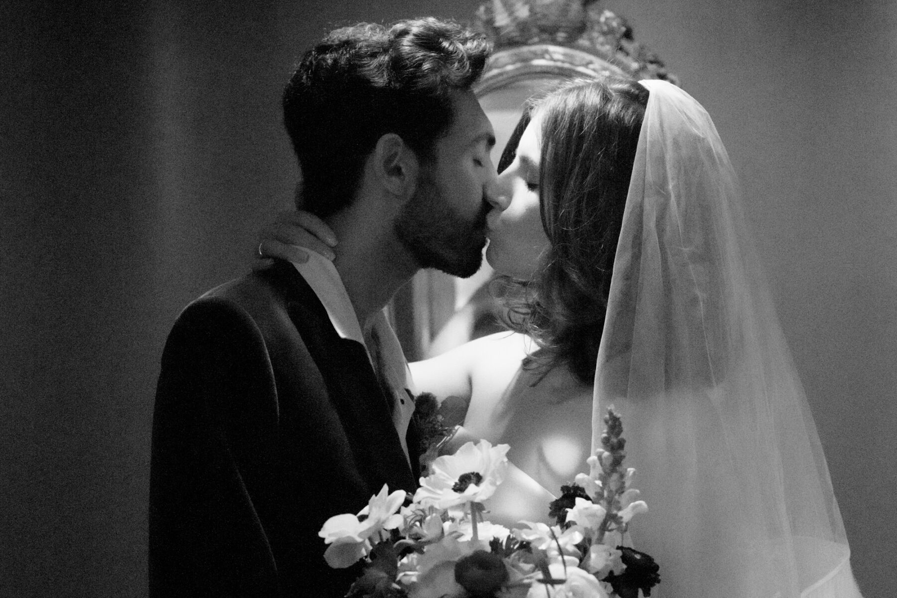 bride and groom kissing