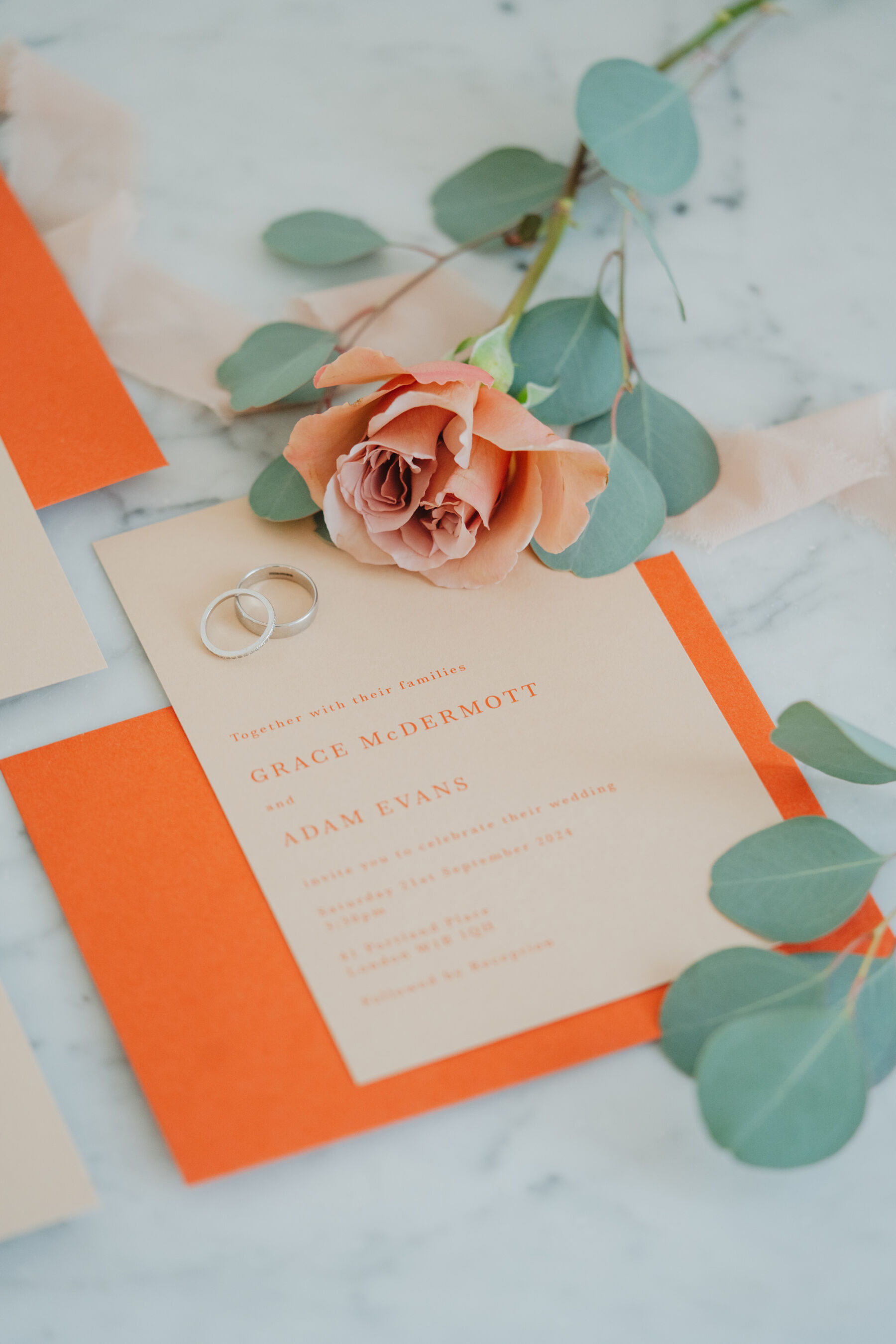 Elegant orange wedding stationery