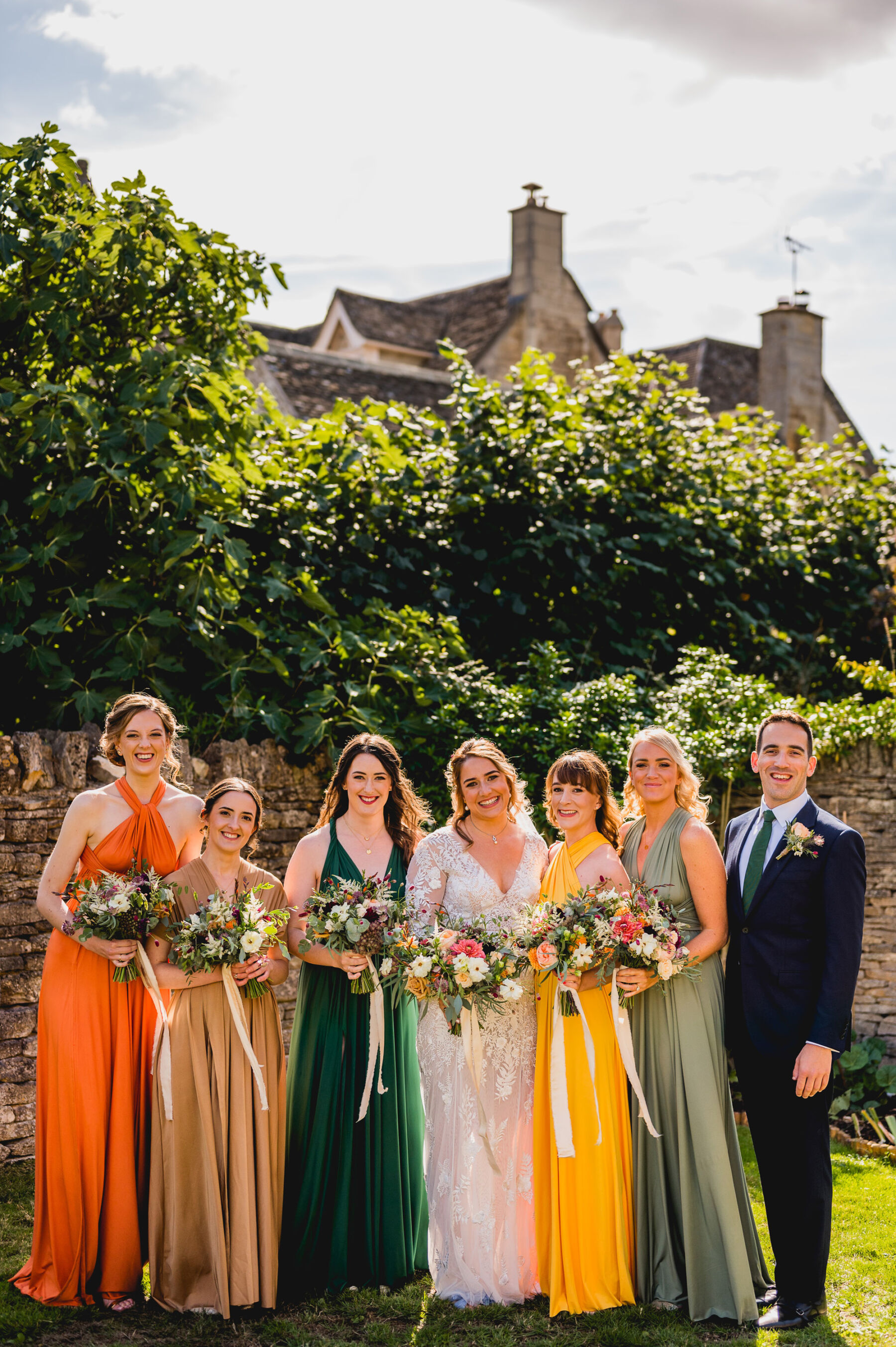 Georgie in Hermione de Paula for her Colourful & Joyful Wedding at Bittenham Springs in Gloucestershire 12 Bridesmaids in colourful dresses