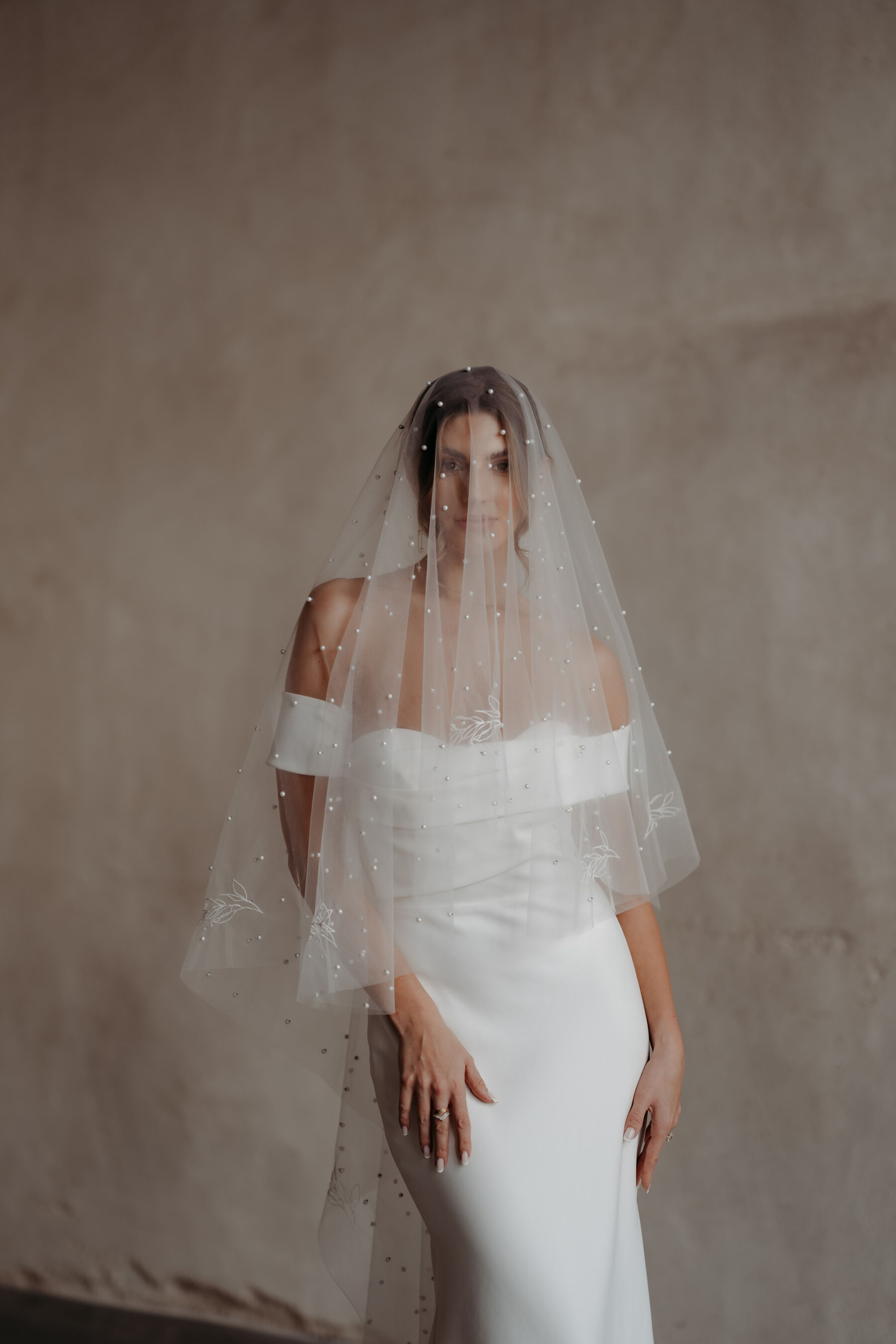 Embroidered wedding veil covered in pearls, by Rebecca Anne Designs