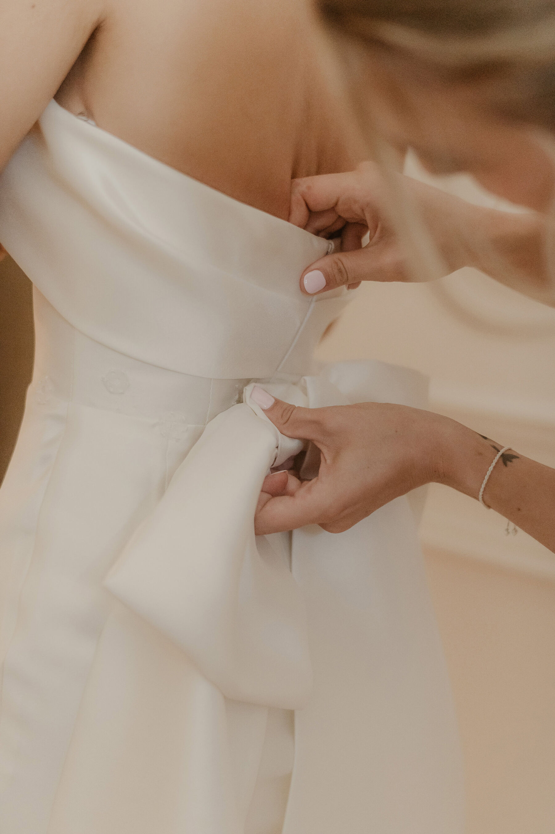 Eva Lendel wedding dress with big bow at the back.