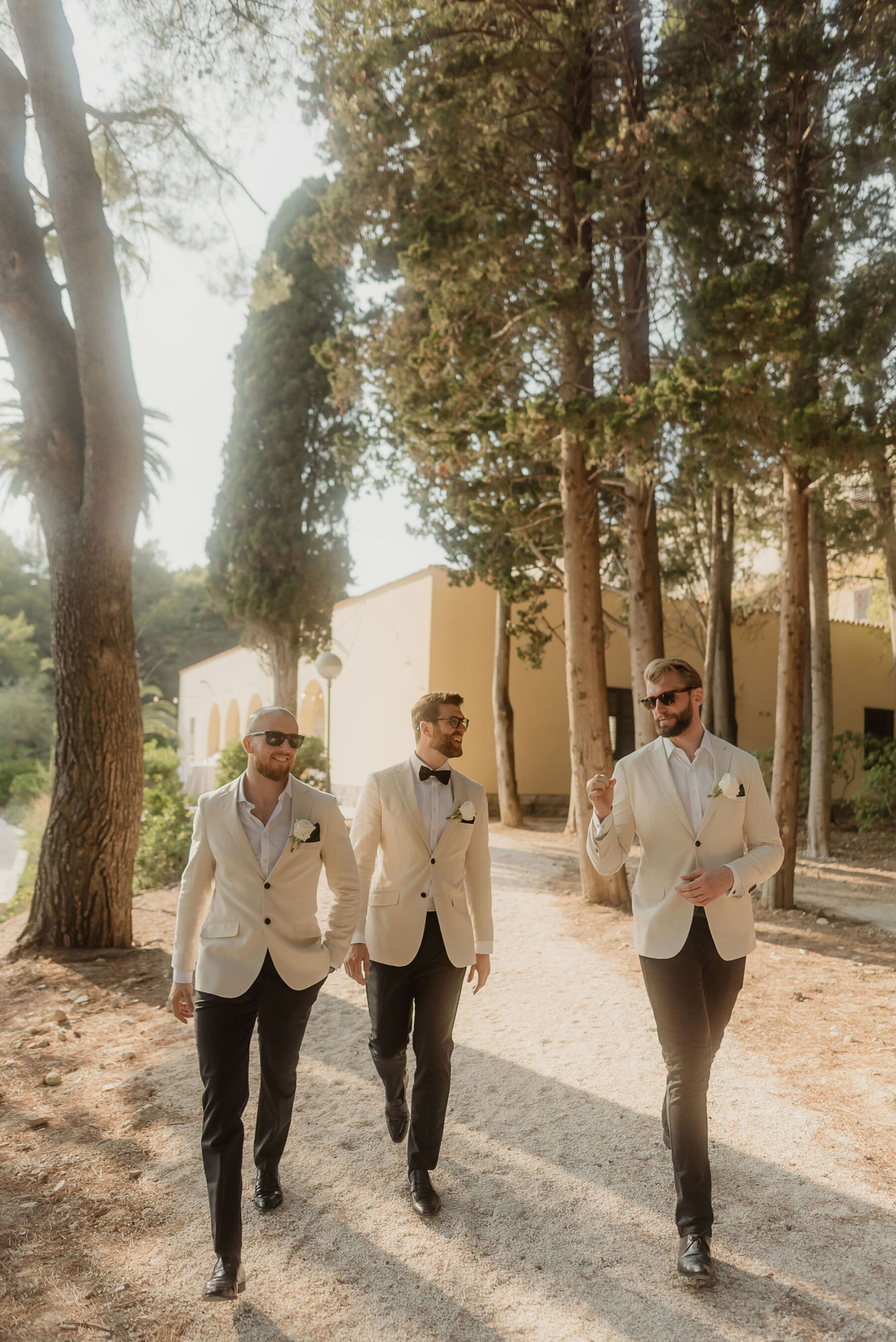 Groomsmen in white tuxedo