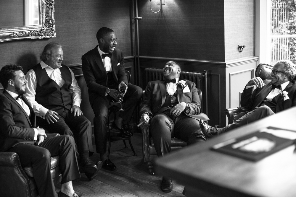 Jesse with his groomsmen. #welshwedding #wales #friendship #documentaryweddingphotography #fineartweddingphotography #1930's #bryngarwhouse #stylishgroomsmen #vintageinspiredsuits #groomsmen #gorgeouslight #laughter