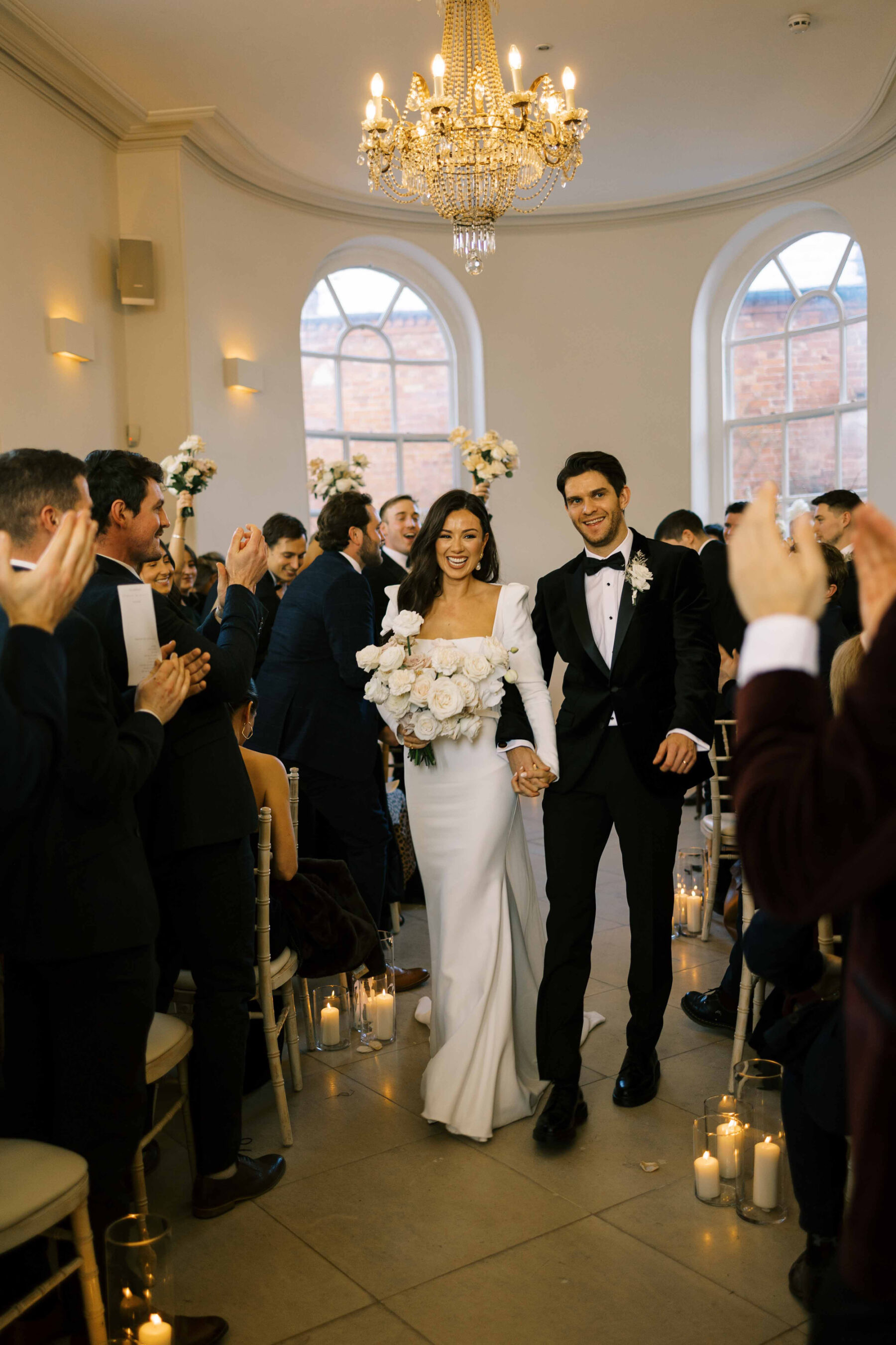 Bride in Suzanne Neville dress at Iscoyd Park - black tie winter wedding