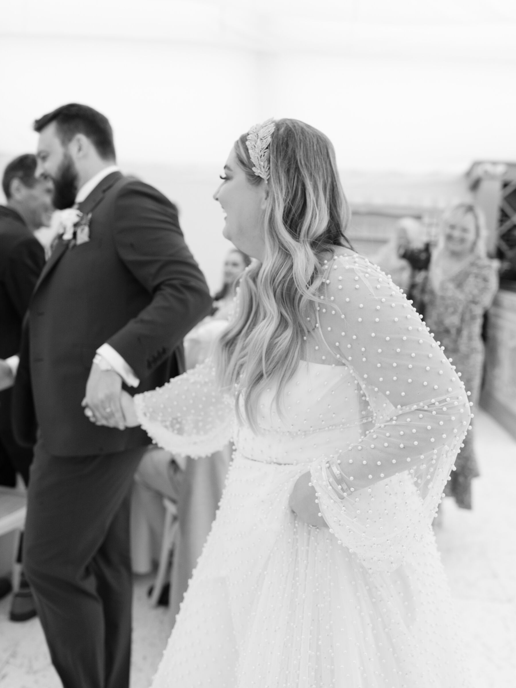 Bride in a pearl wedding dress by Willowby by Watters