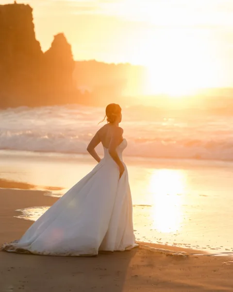 dreamy bridal portrait on beach at sunset