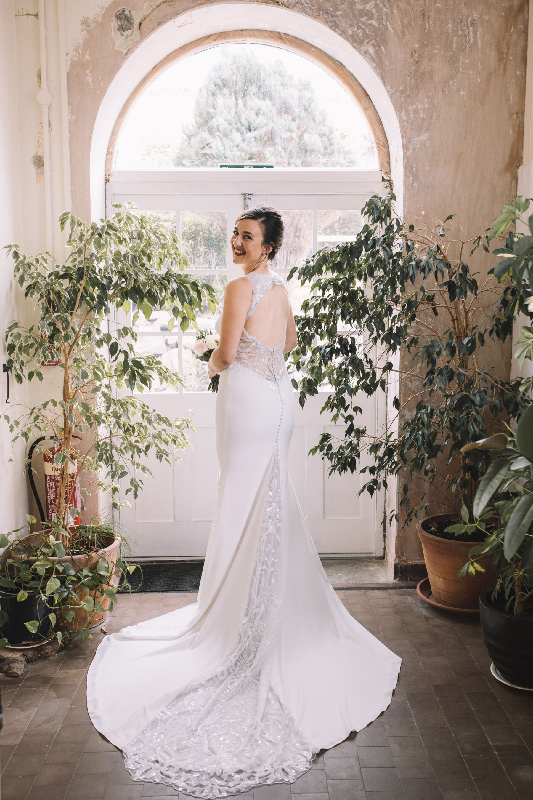 Backless Pronovias wedding dress.