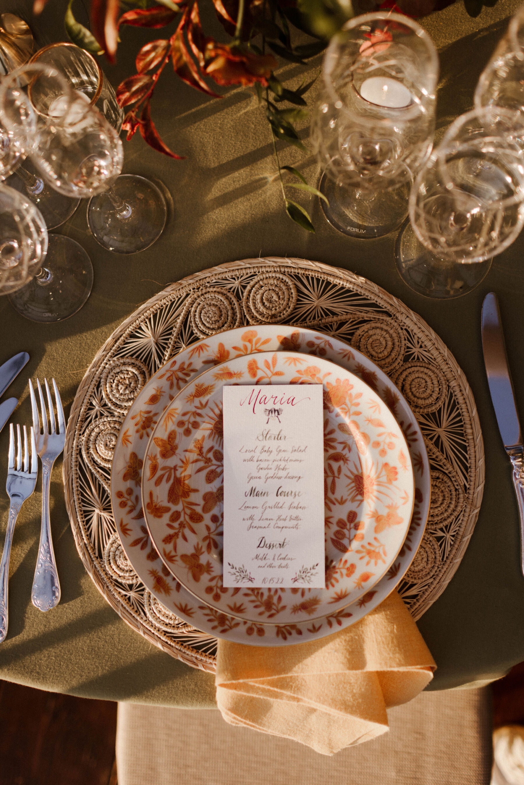 Pretty patterned plates at a wedding reception.
