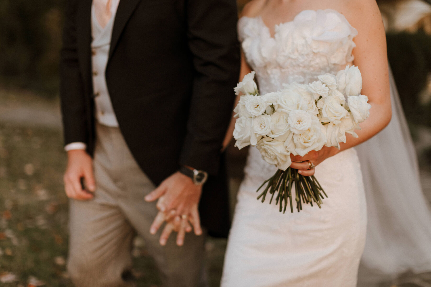 Katie in Sally Bean Couture for her American Wedding Inspired by the Whimsical English Countryside 33 Happy newlyweds. Bride carries and all-white bouquet and wears a Sally Bean wedding dress.