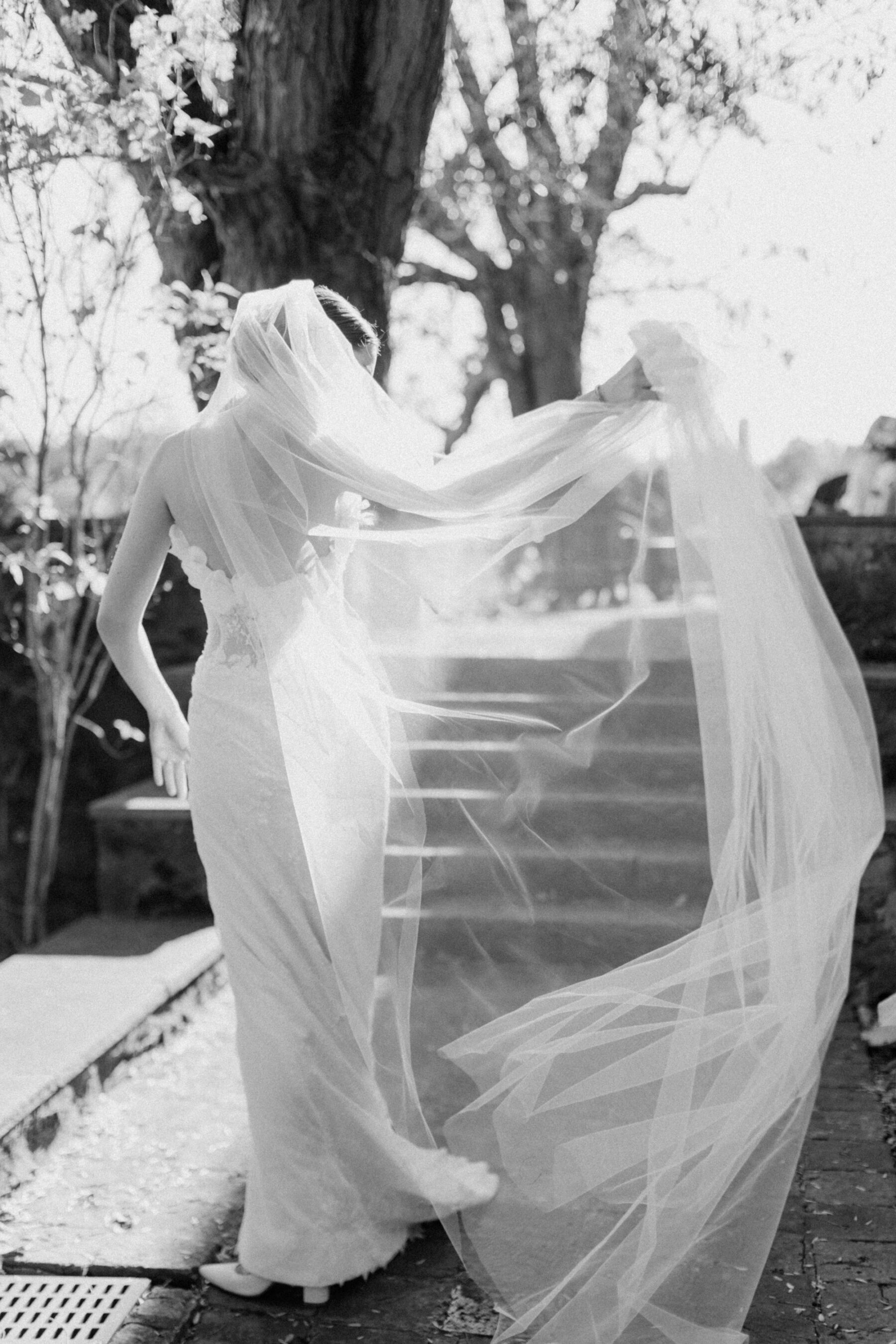 Sally Bean Couture wedding dress and simple long tulle veil.