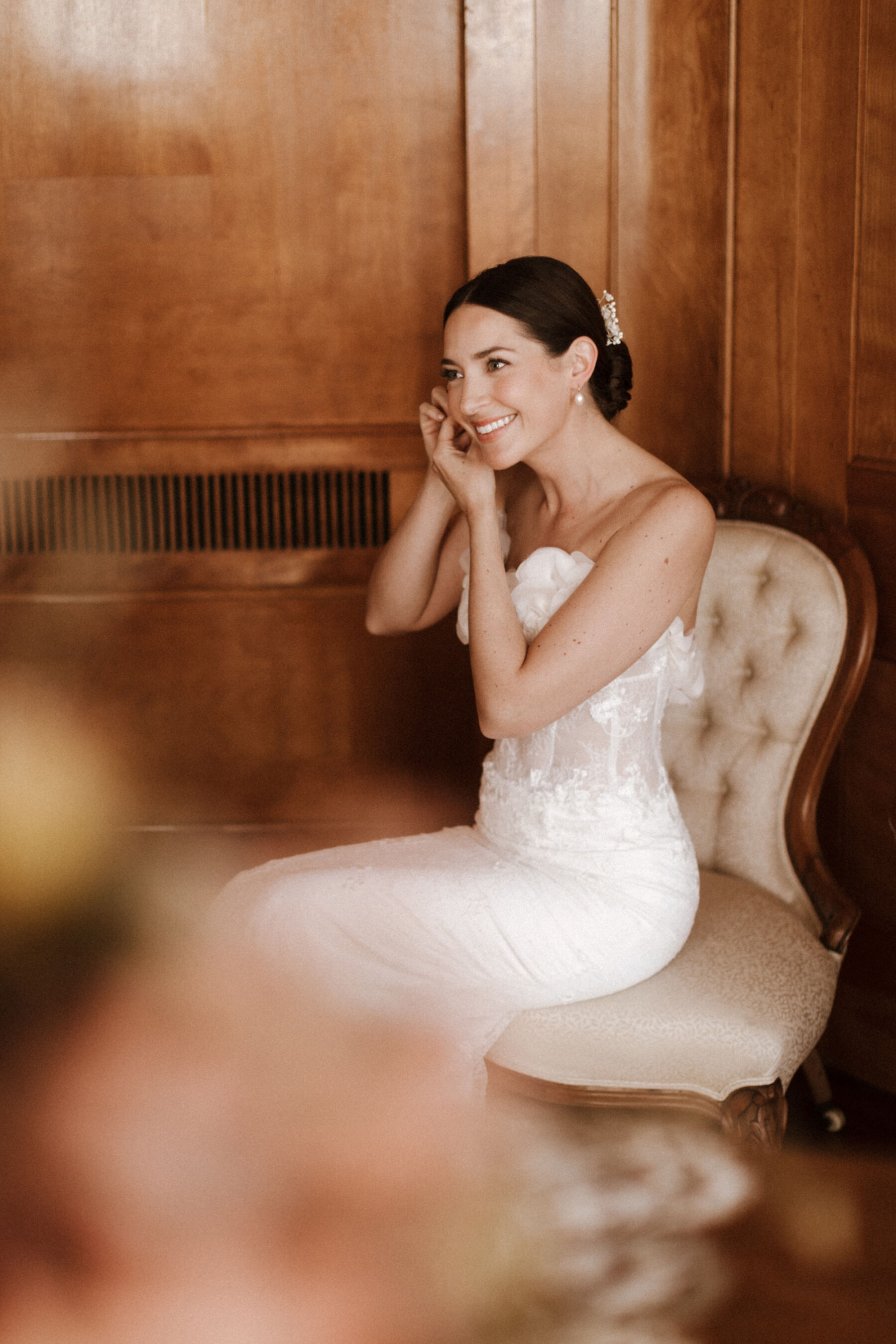 Bride getting ready in her Sally Bean Couture wedding dress.
