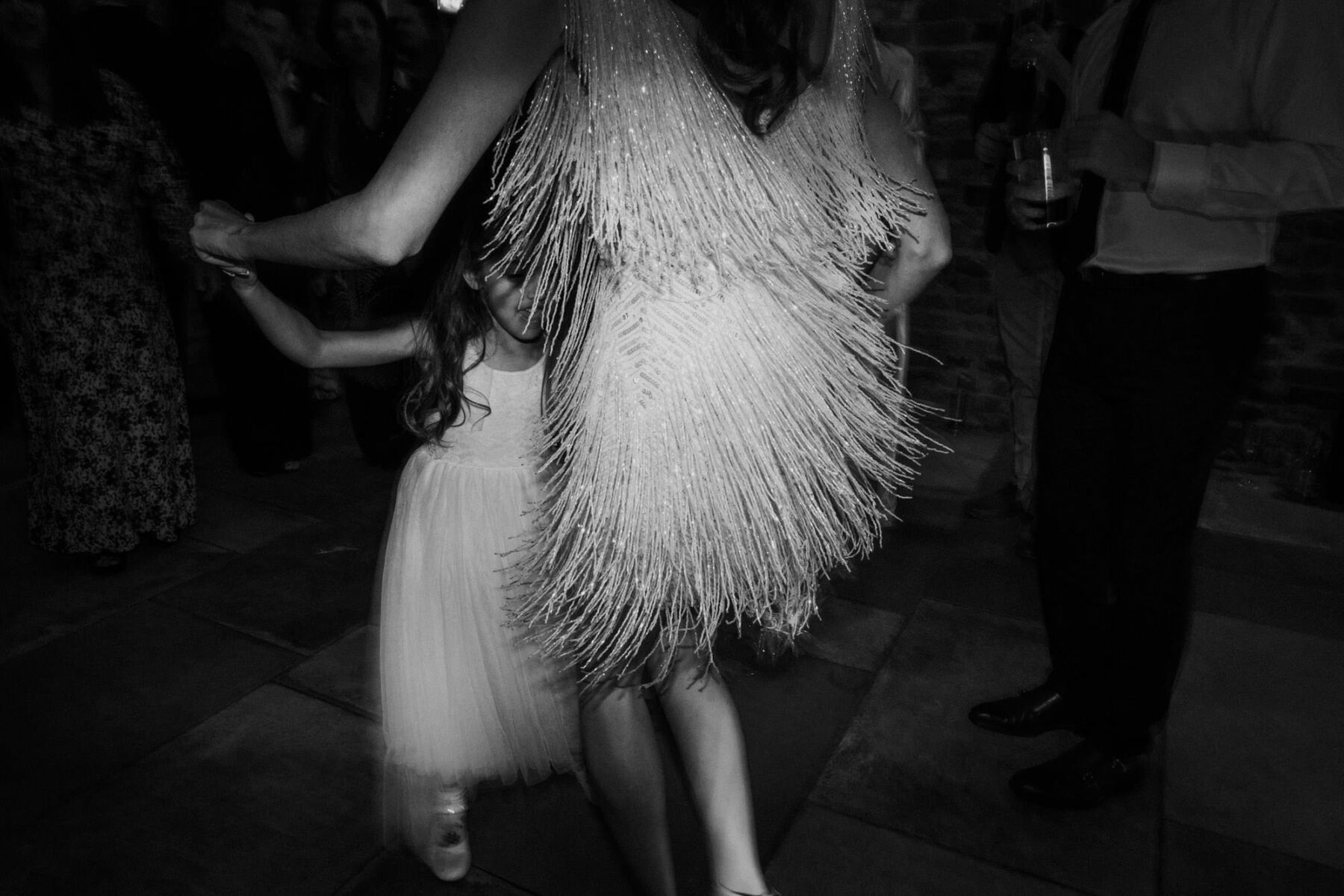 Shake shake it baby, bride dancing in tassel dress.