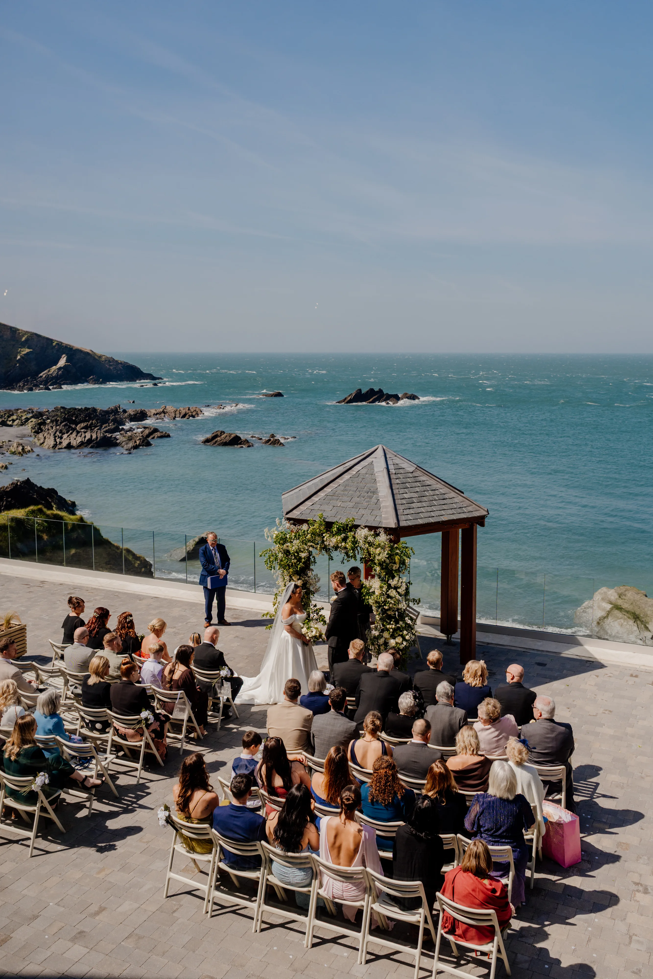 wedding taking place at tunnels beaches outside in ceremony location.
