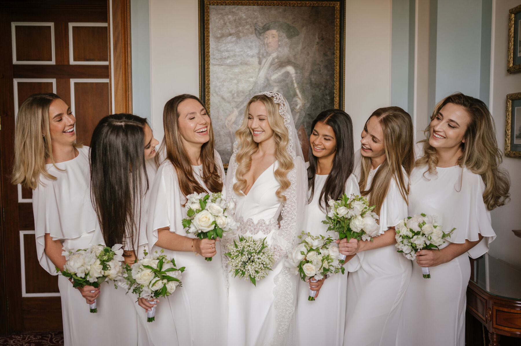 Bridesmaids in white Halston Heritage dresses