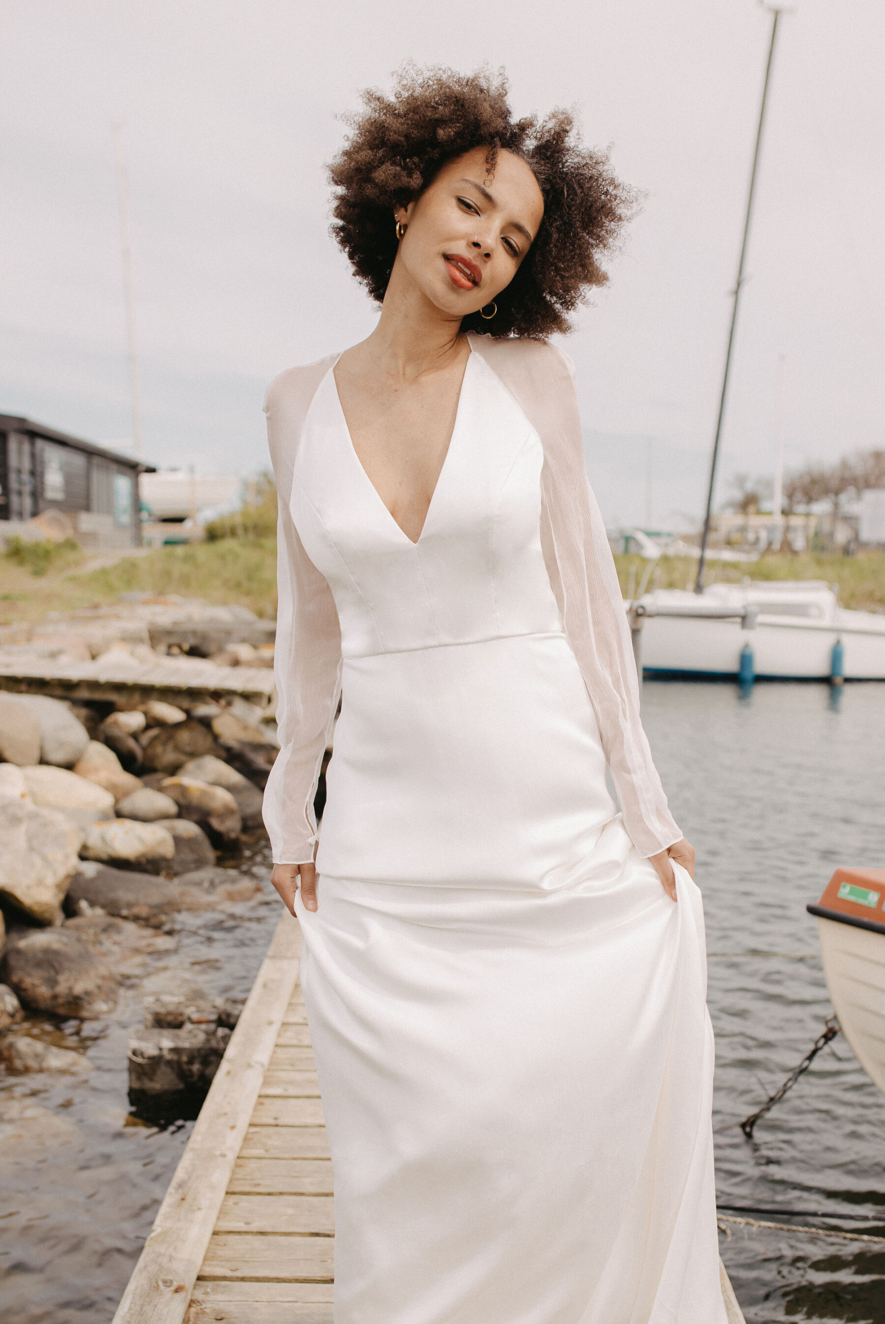 Andrea Hawkes sustainable wedding dress. Biodegradable silk fabrics. Wedding dress with fitted cape.