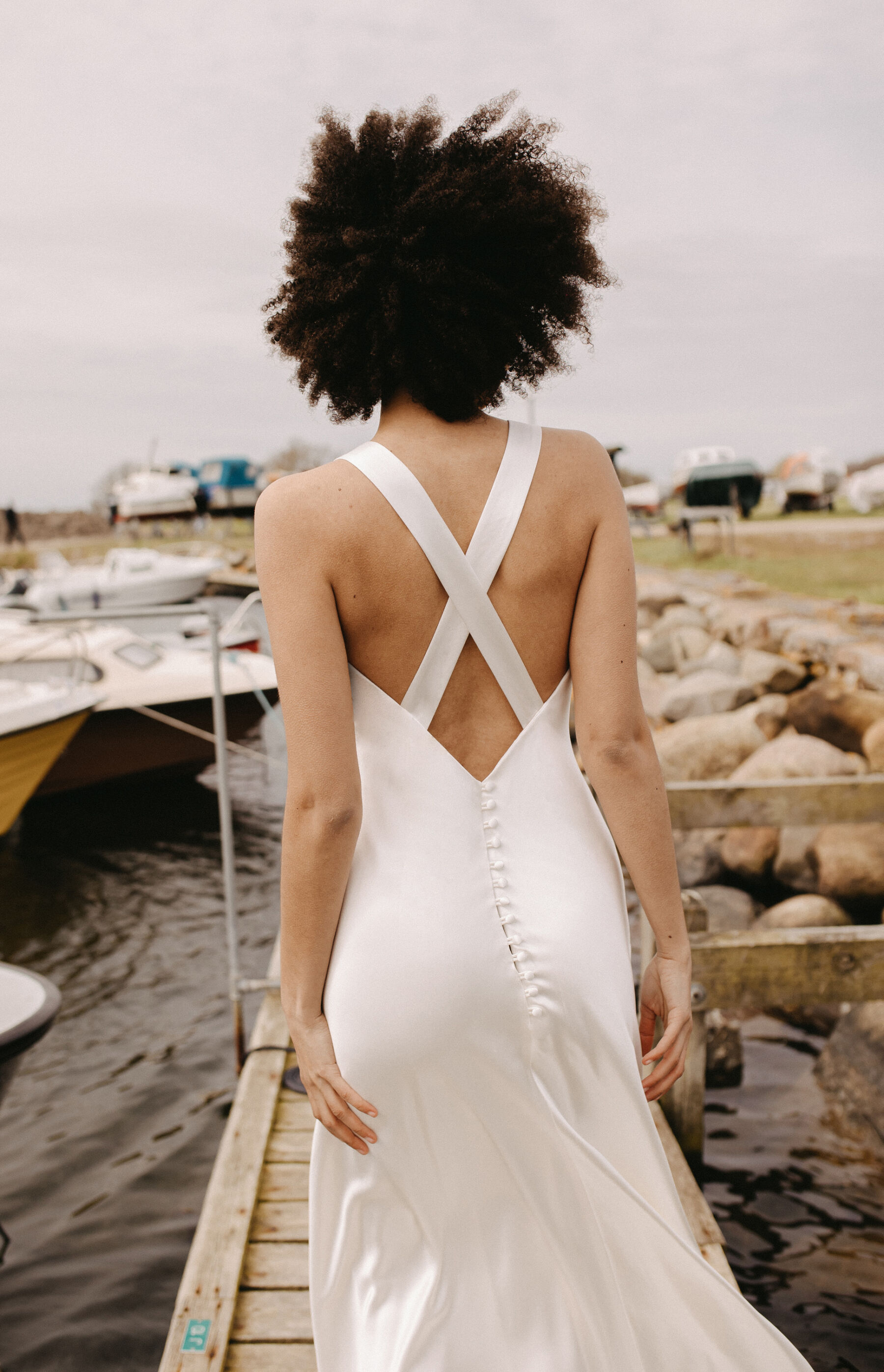What to Expect at a Wedding Dress Appointment With Andrea Hawkes - Sustainable Bridal Designer, London 8 Andrea Hawkes sustainable bridal gown with straps crossing on the back