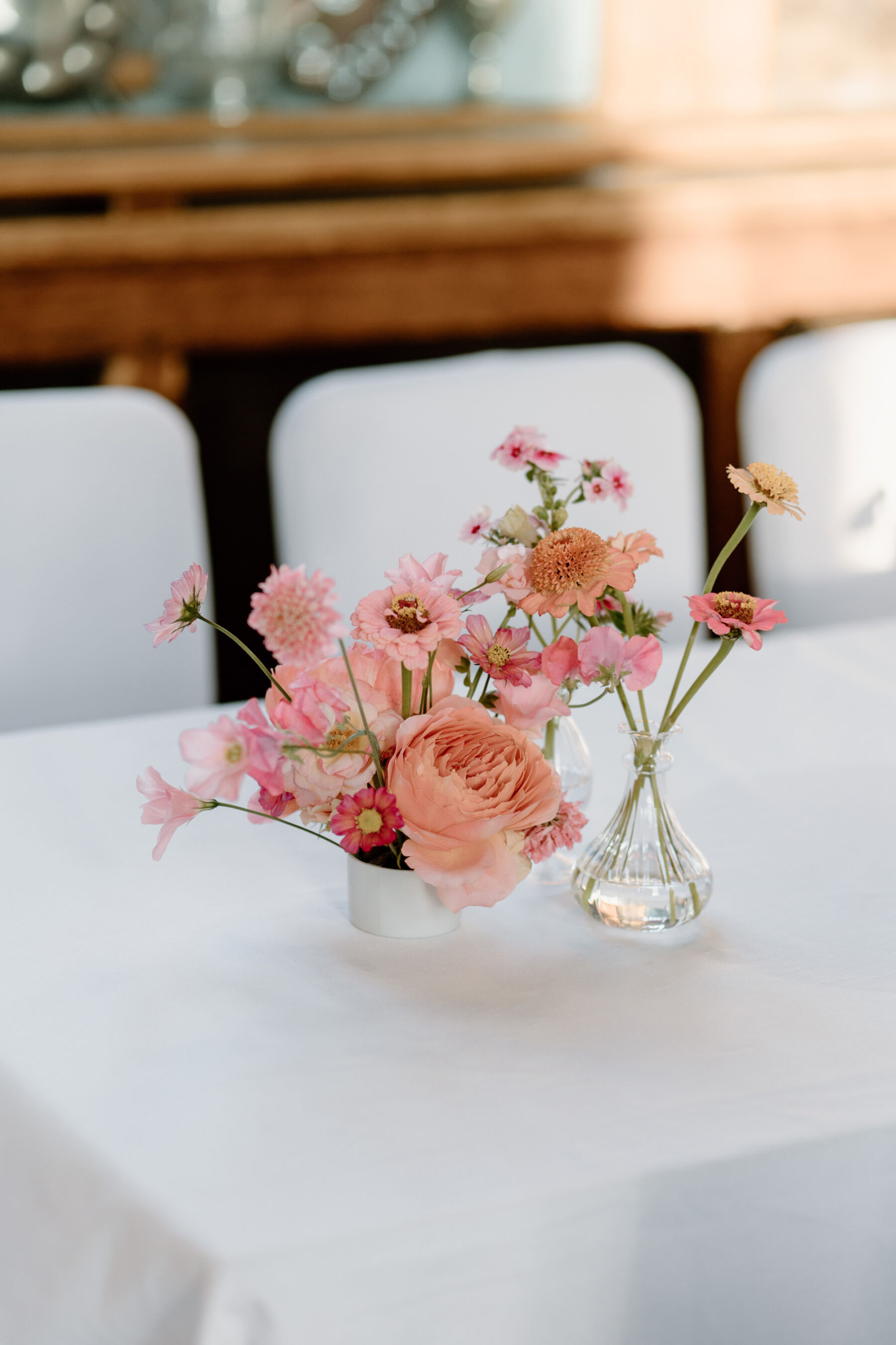 Livia in a Truvelle Bridal Gown for her Durham Castle Wedding With an Outdoor Summer Garden Ceremony 29 Elegant pastel wedding flowers table decor.