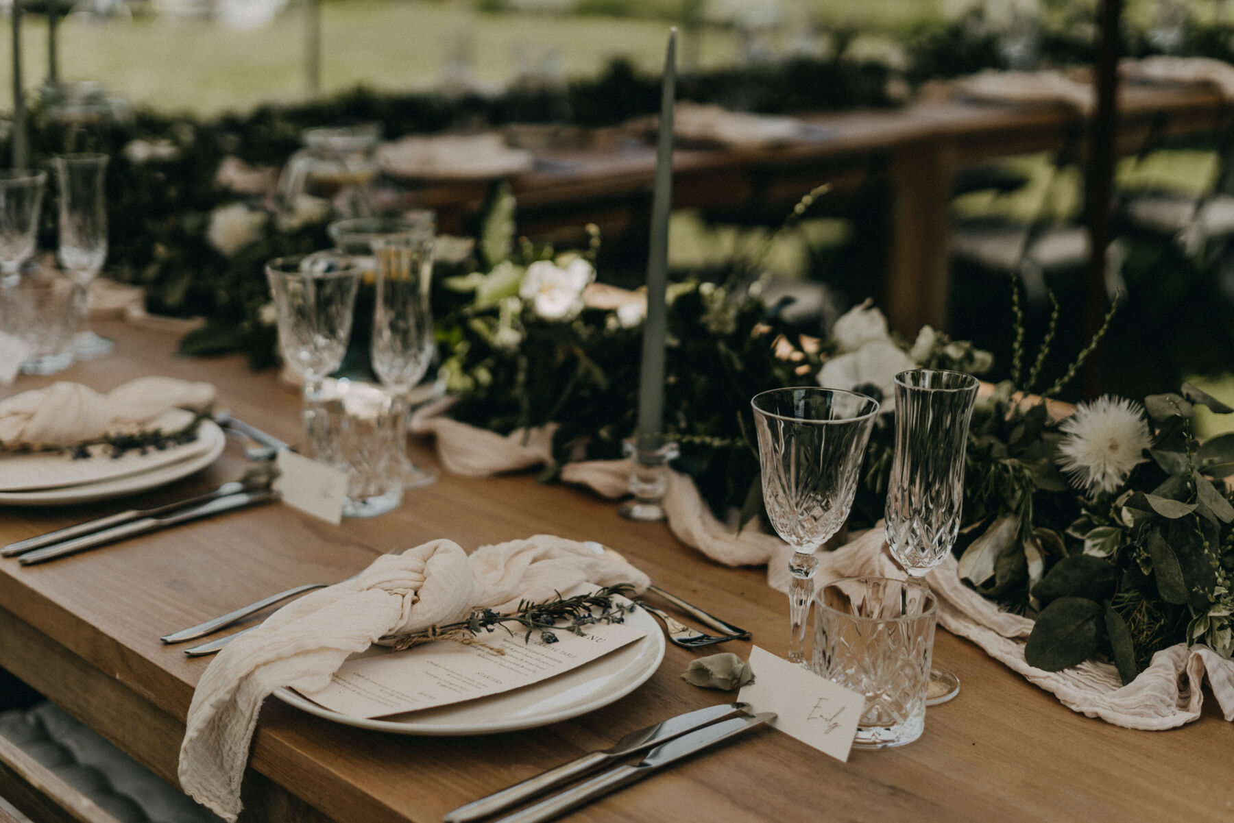 Emily in a Bespoke Halterneck Gown for her Elegant Chateau De Puissantut Wedding in South West France 26 Wedding tableware with pale linen knotted napkins