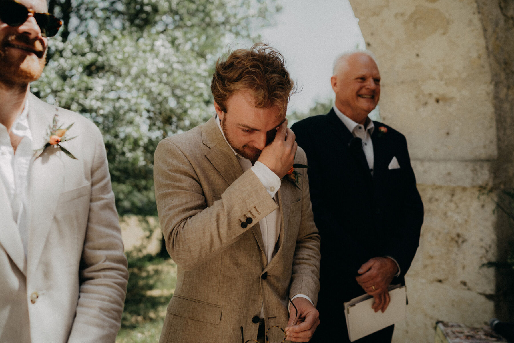 Groom weeping at seeing his bride arrive at the ceremony.