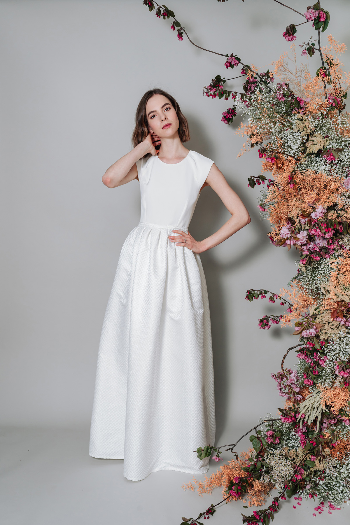 Kate Beaumont wedding dress with gathered waist and pockets.