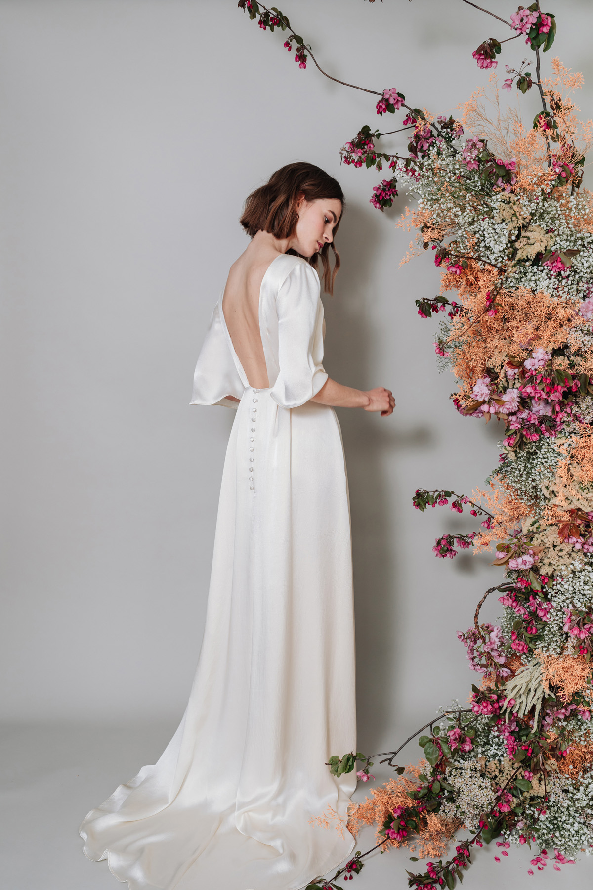 Kate Beaumont backless wedding dress in sustainable silk.