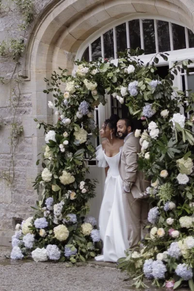 flower installation arch by Lake District wedding florist seed and wild floral design at Casterton grange