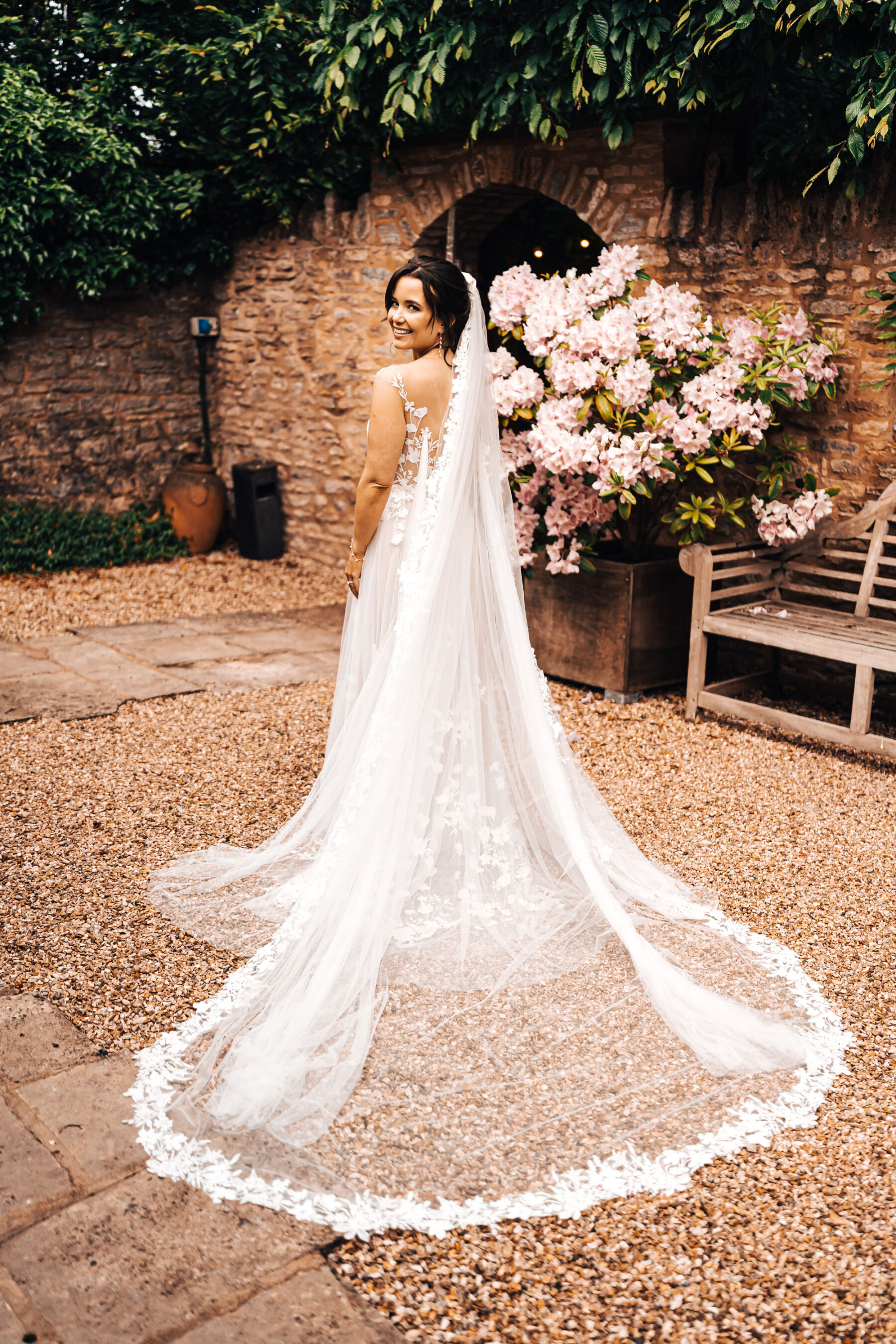 Bride in an Anna Kara dress at Tythe Barn wedding venue in the Cotswolds.