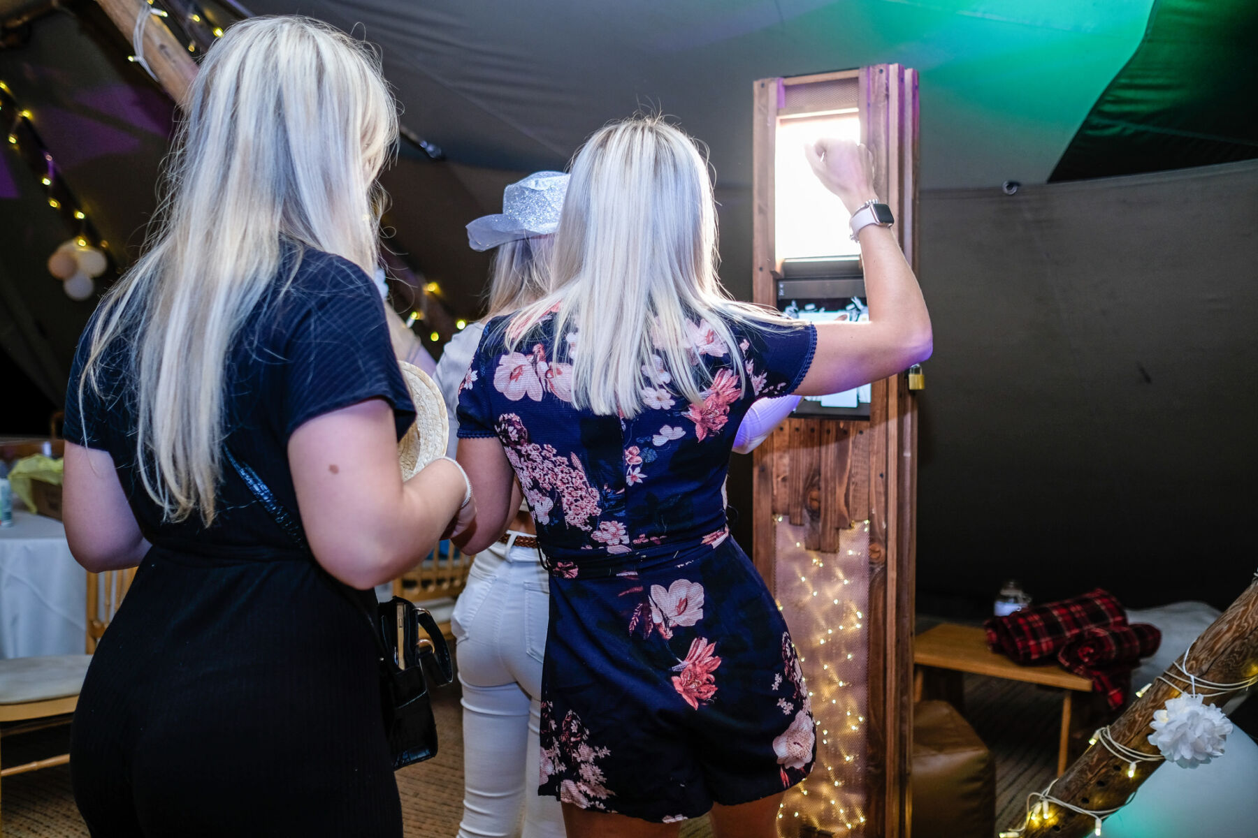 Guests taking selfies using the Fizz & Groove Selfid Pod Hire service.