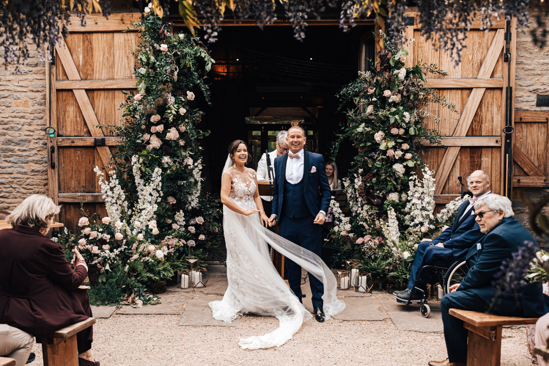 Bride in an Anna Kara dress at Tythe Barn wedding venue in the Cotswolds.